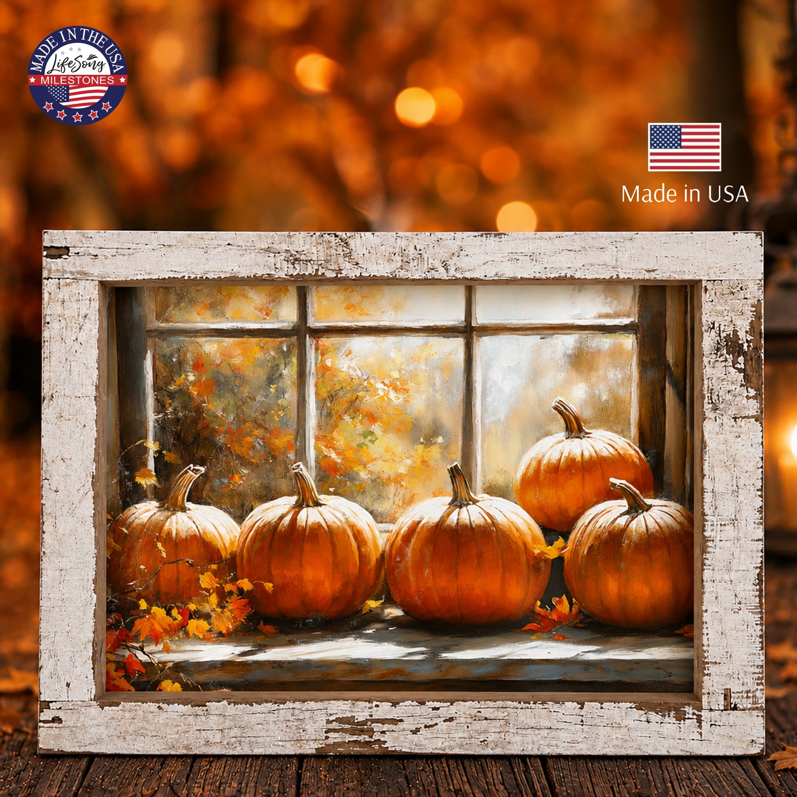 Framed autumn wall art of five orange pumpkins on a sunlit windowsill in a 13.75 x 17.75 inch distressed white barnwood frame