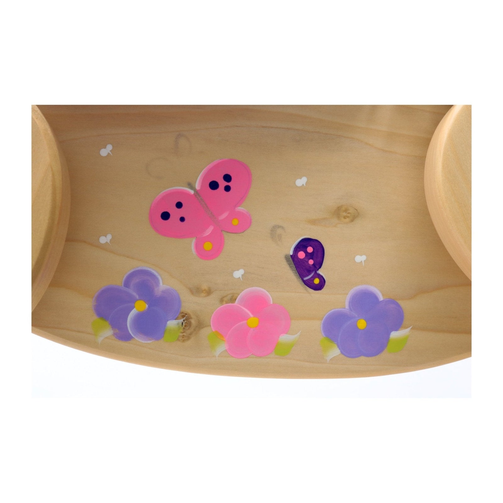 Decorative painted flowers on wooden rocking horse body