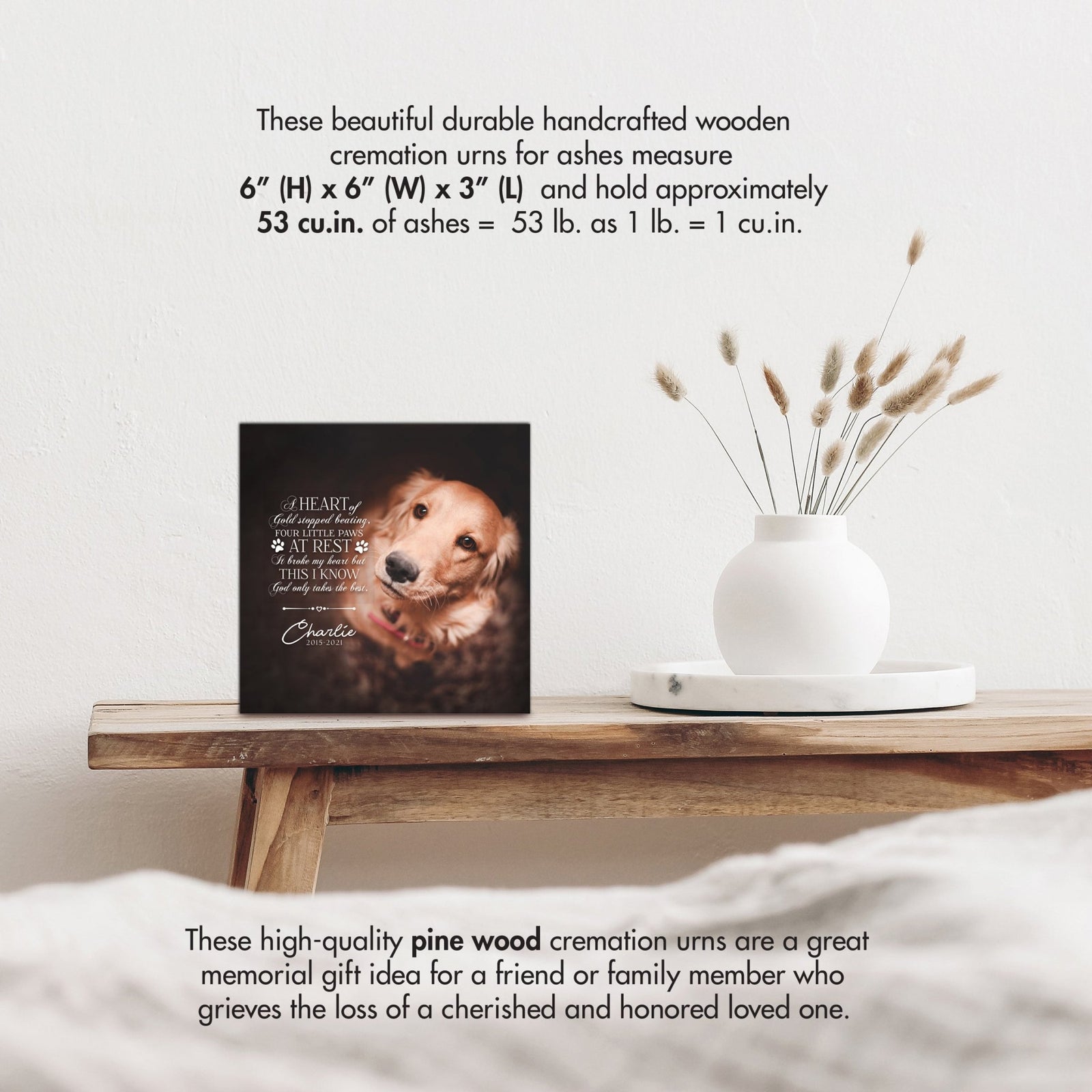 Wooden pet urn shadow box by Lifesong Milestones displayed on a rustic wooden table with a white vase of pampas grass, showcasing a custom photo of Bella with the heartfelt message. Ideal for memorial shadow box ideas or personalized pet urns for ashes