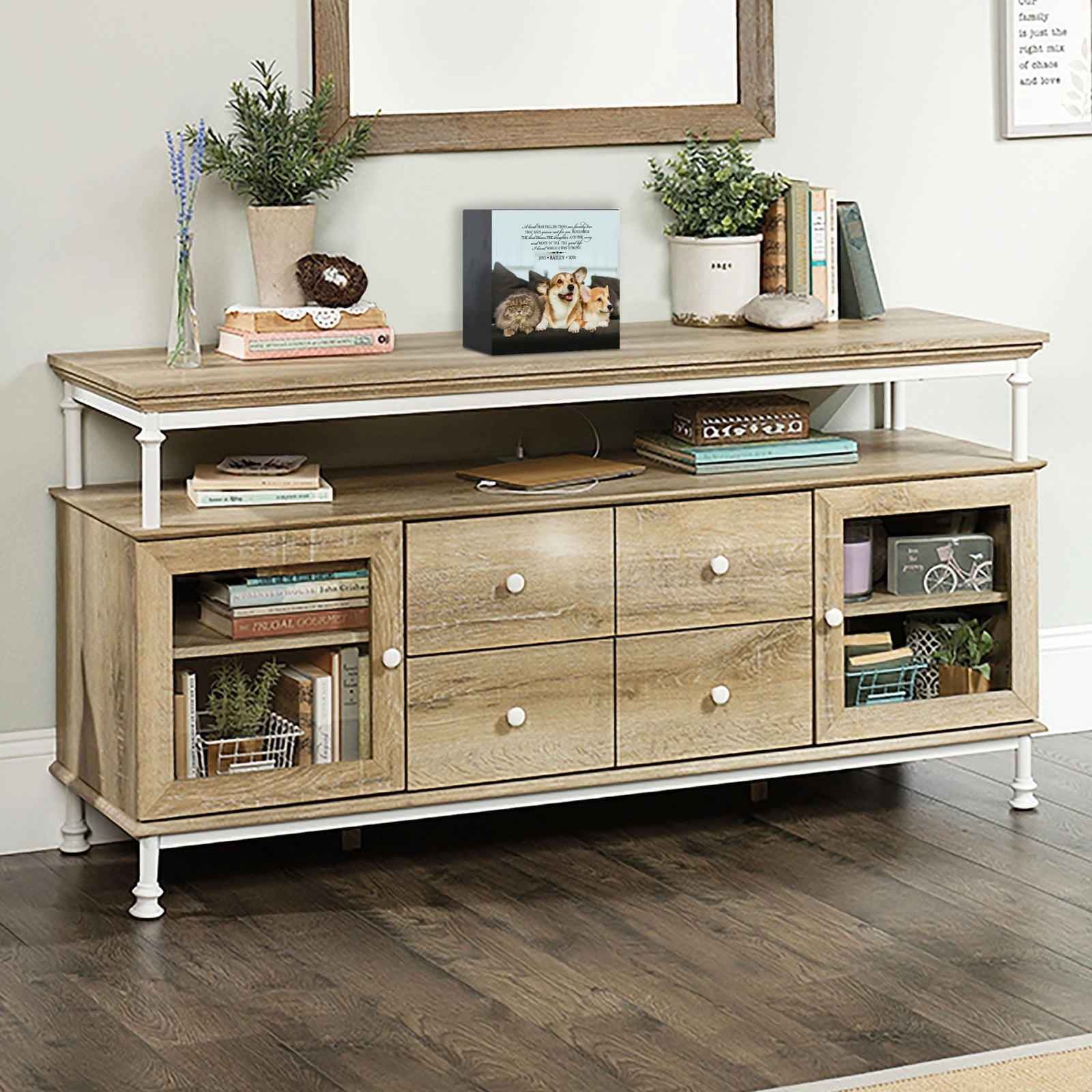 Wooden pet urn shadow box displayed on a rustic wooden TV console in a cozy living room. The shadow box features a custom photo of a pet. A touching bereavement keepsake box ideal for memorial shadow box ideas and personalized pet urns for ashes.