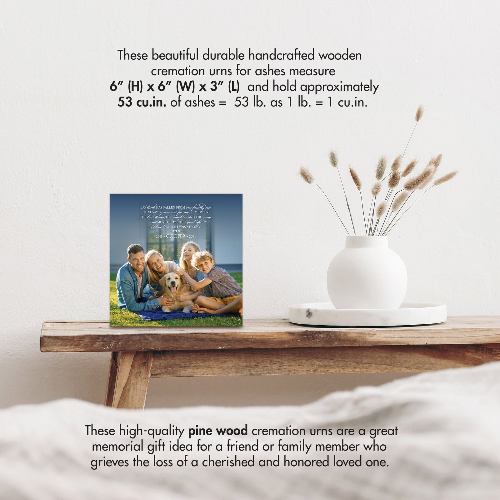 Wooden pet urn shadow box by Lifesong Milestones displayed on a rustic wooden table with a white vase of pampas grass, showcasing a custom photo of Bella with the heartfelt message. Ideal for memorial shadow box ideas or personalized pet urns for ashes