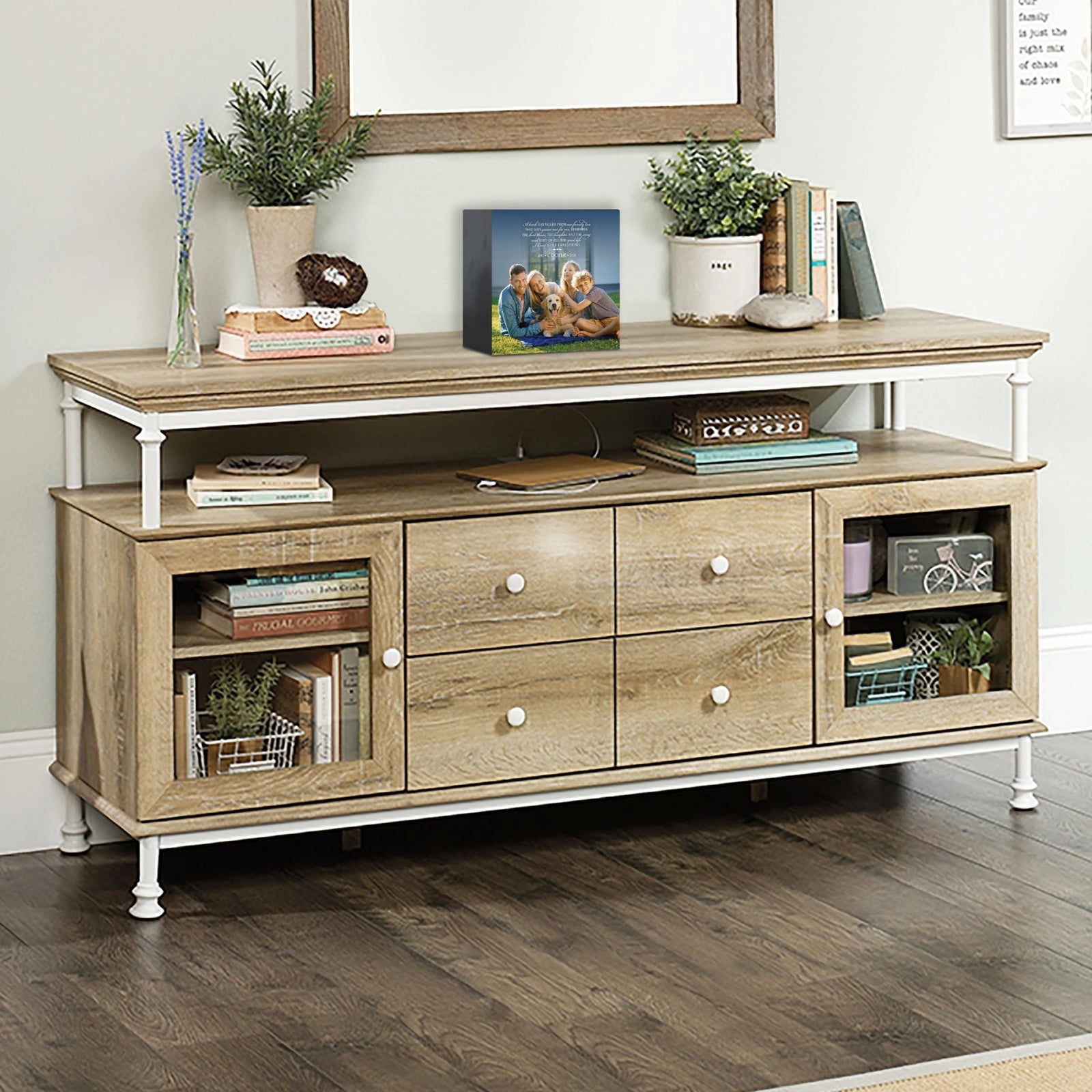 Wooden pet urn shadow box displayed on a rustic wooden TV console in a cozy living room. The shadow box features a custom photo of a pet. A touching bereavement keepsake box ideal for memorial shadow box ideas and personalized pet urns for ashes.