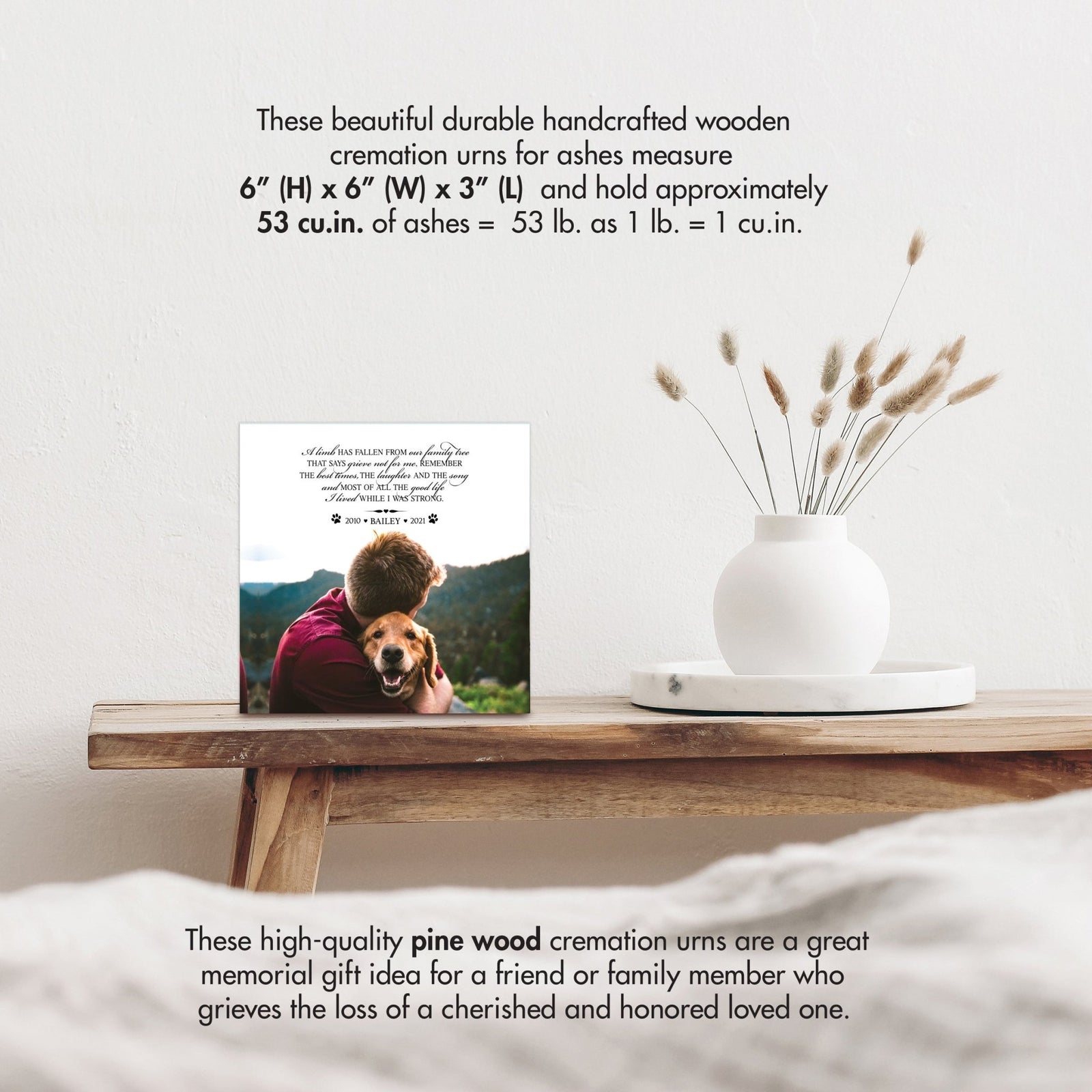 Wooden pet urn shadow box by Lifesong Milestones displayed on a rustic wooden table with a white vase of pampas grass, showcasing a custom photo of Bella with the heartfelt message. Ideal for memorial shadow box ideas or personalized pet urns for ashes