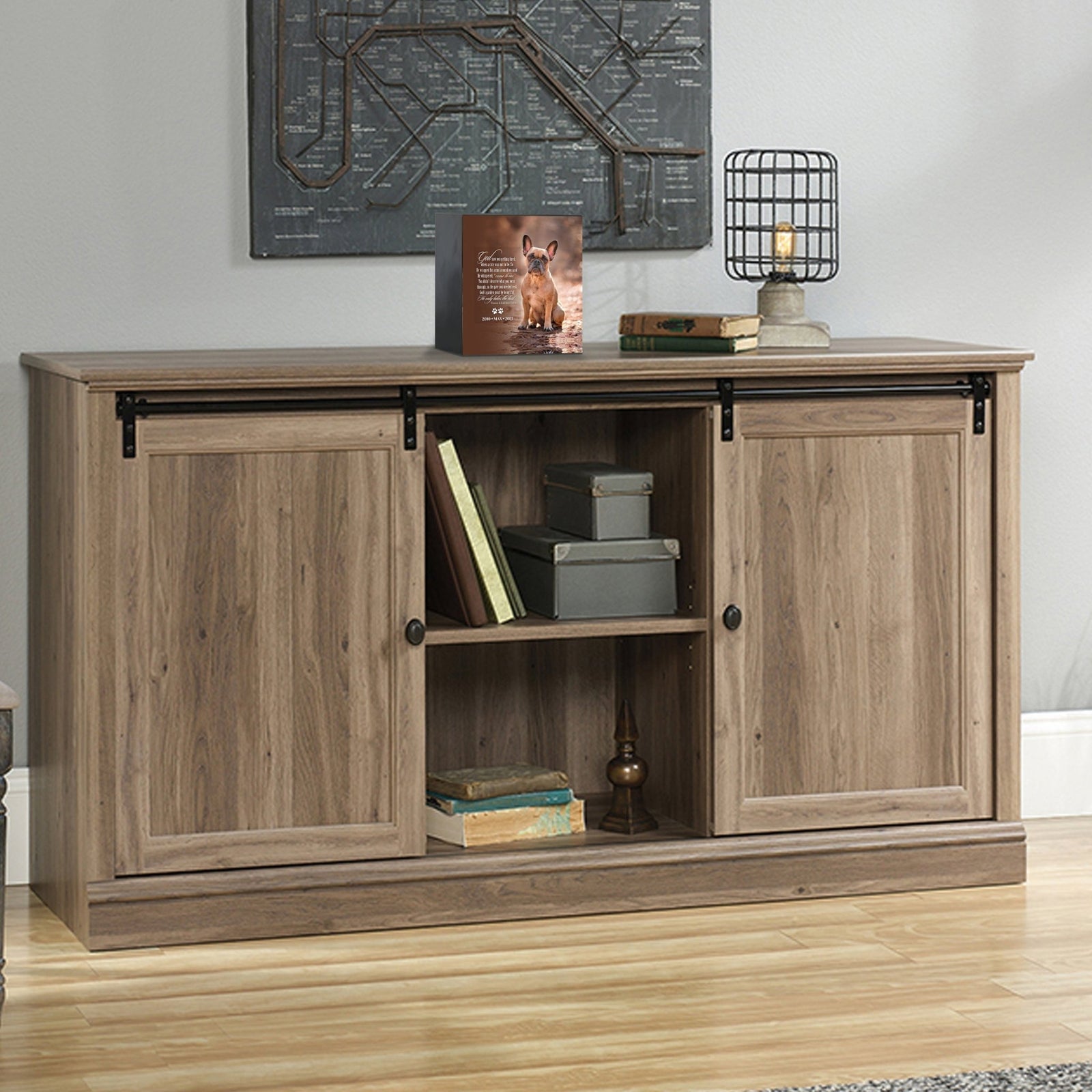 Custom wooden pet urn shadow box displayed on a rustic wooden cabinet in a cozy living room. The personalized pet memorial shadow box features a customized photo of a pet and a heartfelt message. A perfect bereavement keepsake box and sympathy gift for honoring the loss of a beloved pet, blending warmth and sentiment with home décor.