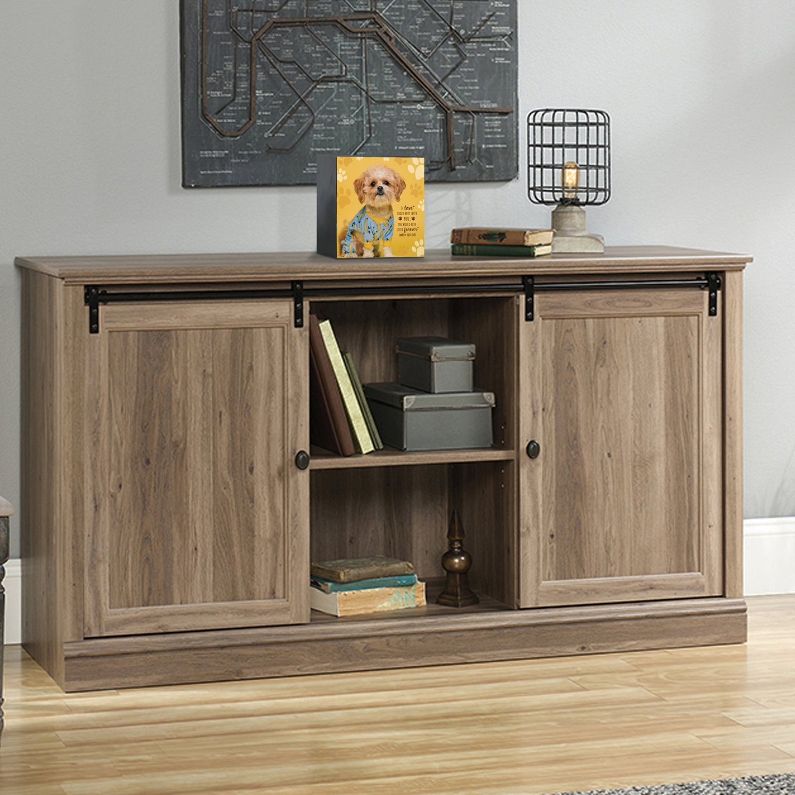 Custom pet cremation urns for ashes displayed on a stylish console table.