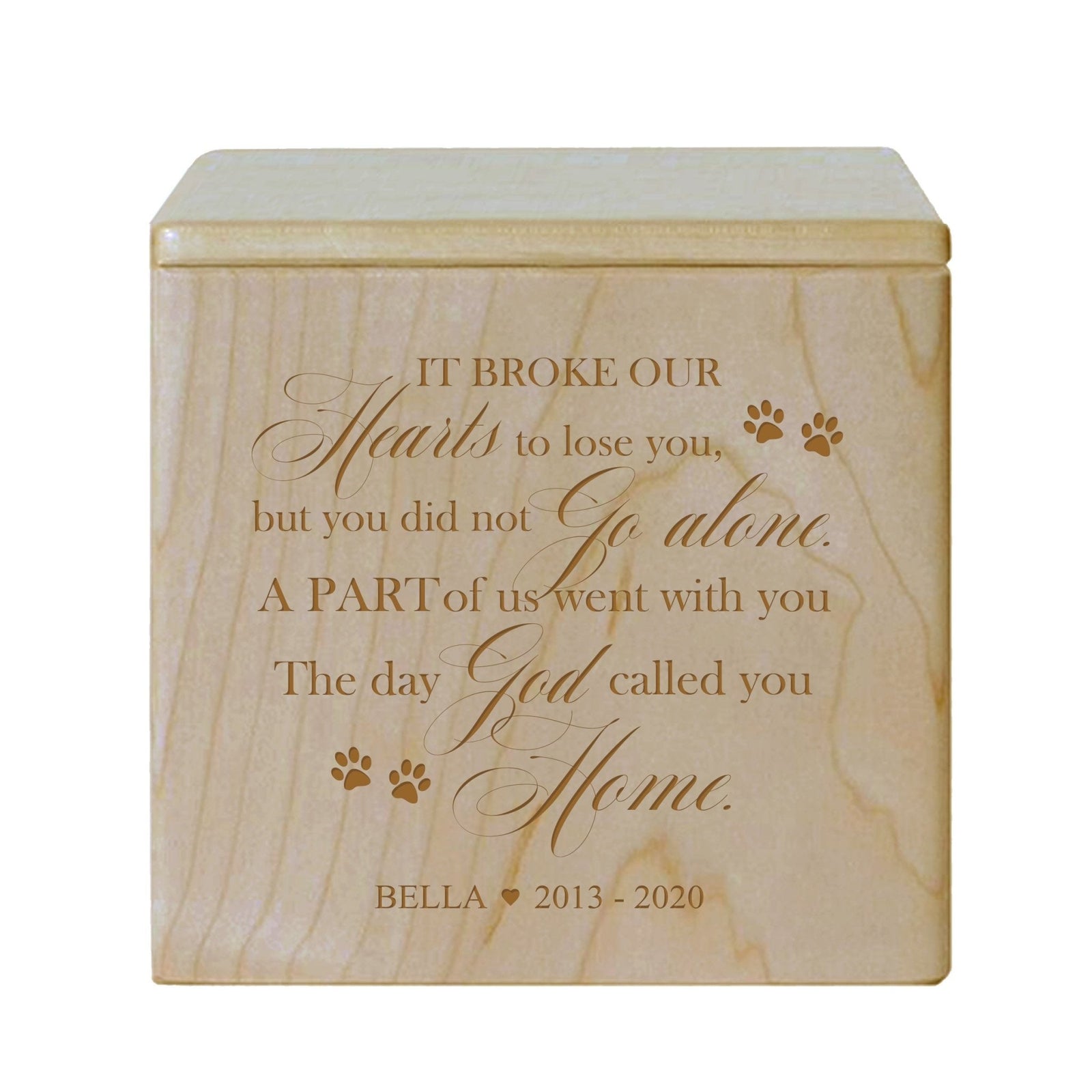 A beautifully crafted wooden pet urn in maple wood featuring delicate paw prints. This dog cremation urn or cat cremation urn is a heartfelt pet memorial urn to honor a beloved companion.