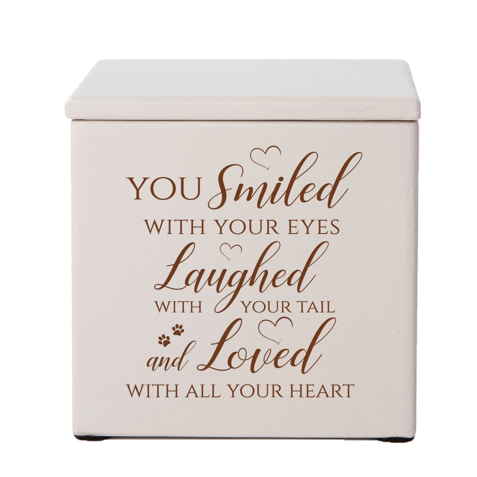 A classic ivory Pet Urns for Ashes featuring a sentimental engraving and delicate paw prints.