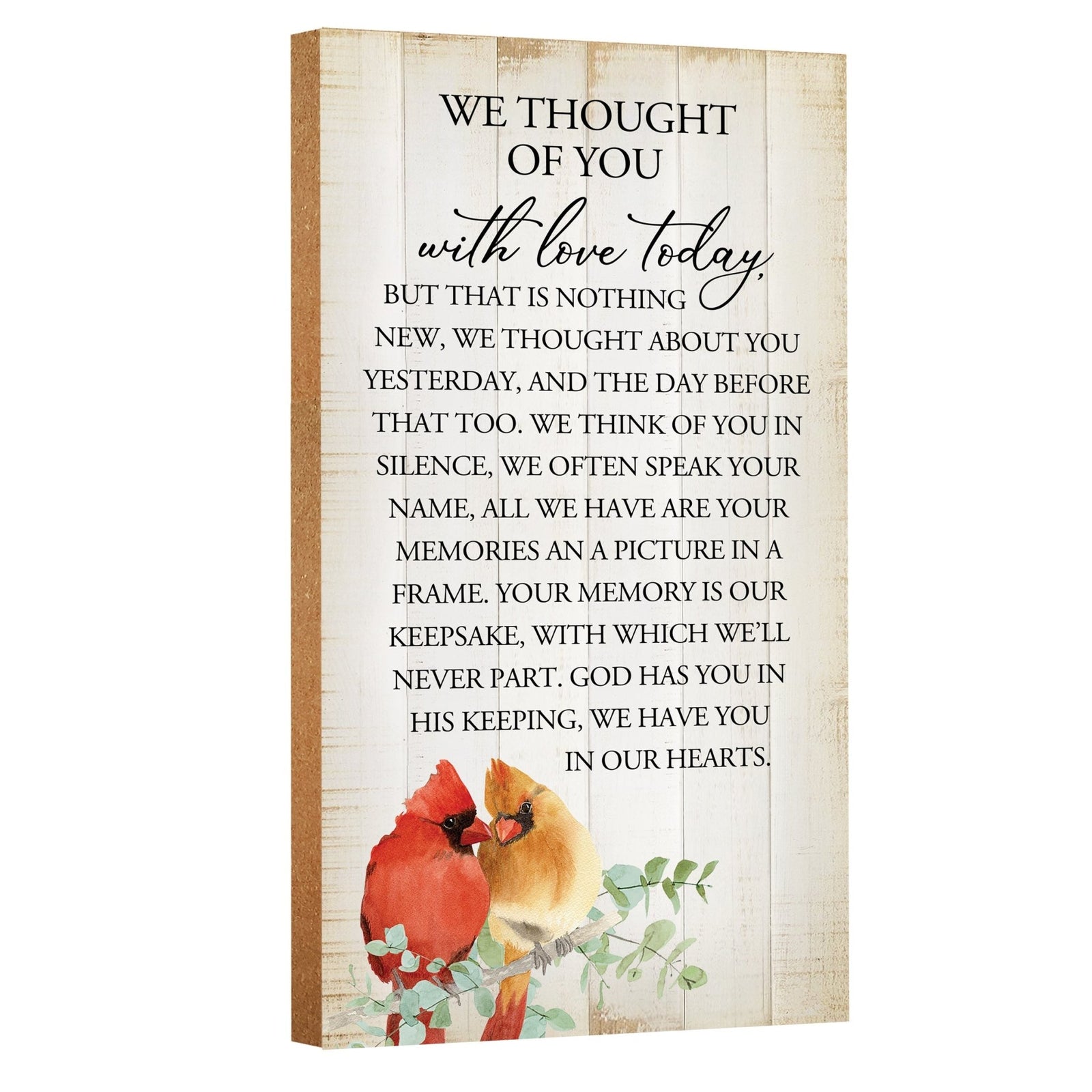 A wooden memorial wall plaque with a heartfelt design.