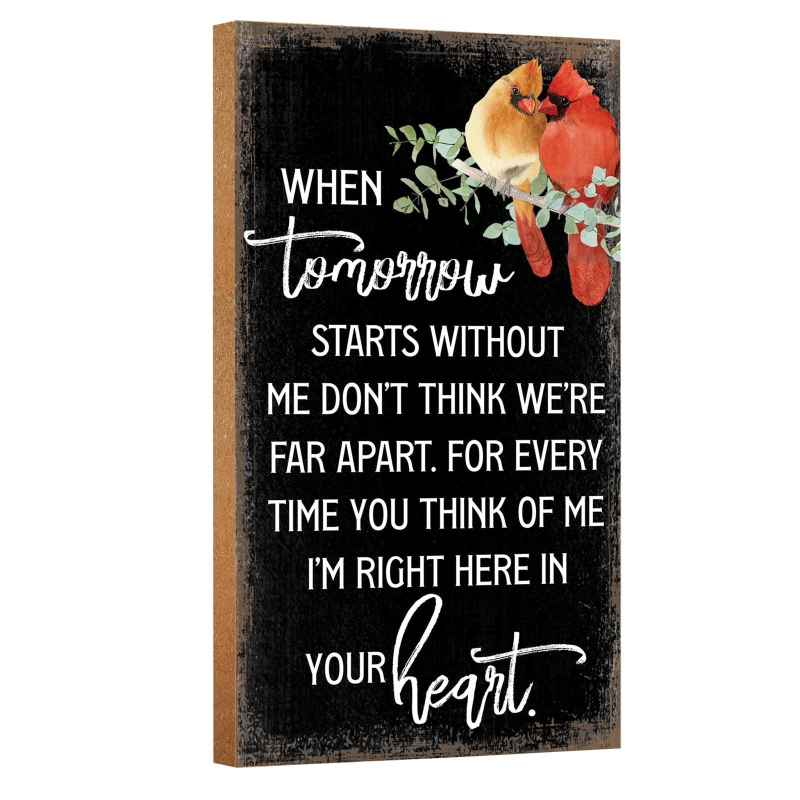 A wooden memorial wall plaque featuring a cardinal, a symbol of remembrance and love.