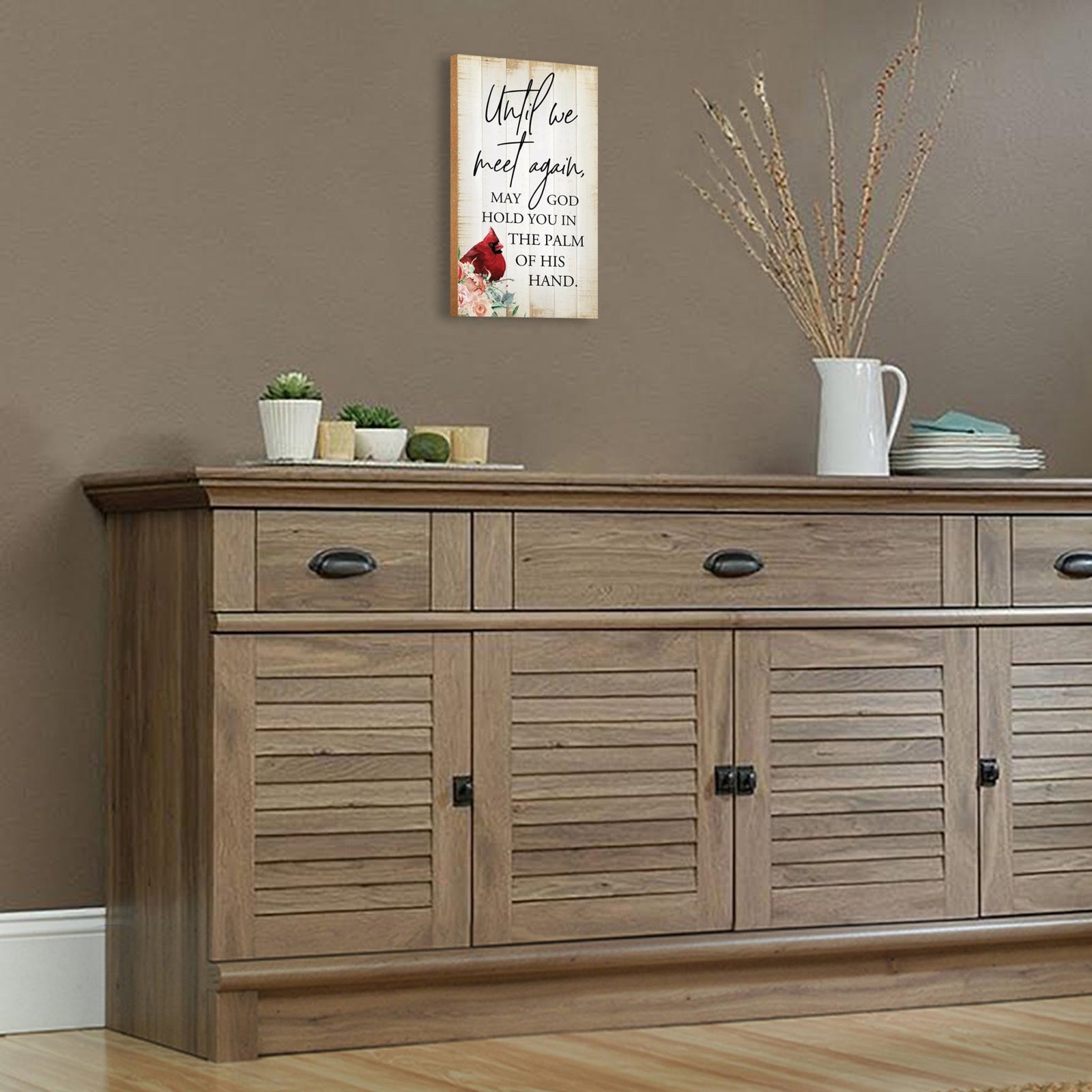 A wooden memorial wall plaque with a heartfelt design.