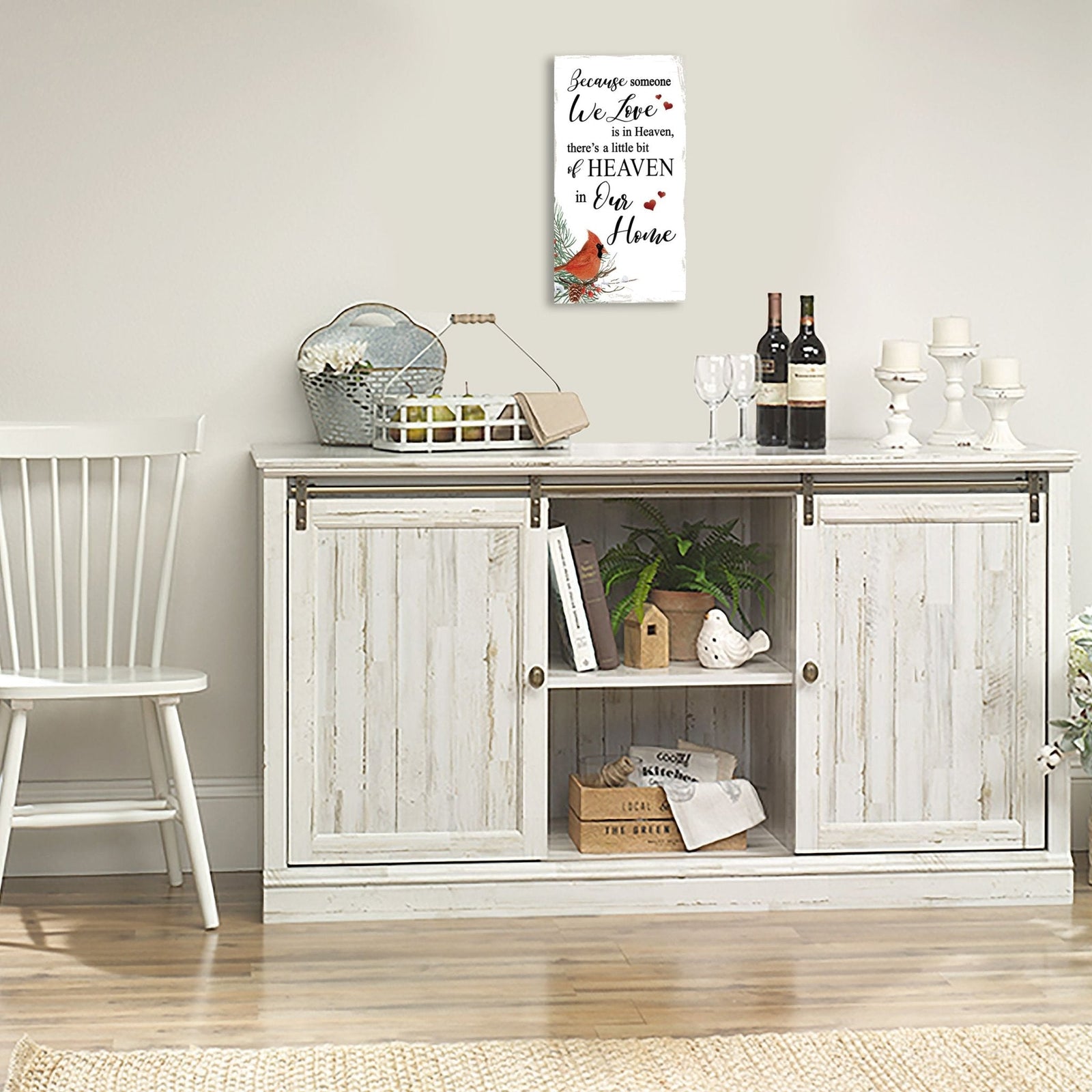 A wooden memorial wall plaque featuring a cardinal, a symbol of remembrance and love.