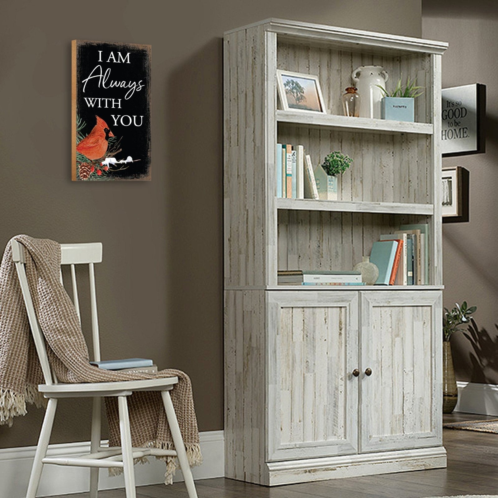 A wooden memorial wall plaque featuring a cardinal, a symbol of remembrance and love.