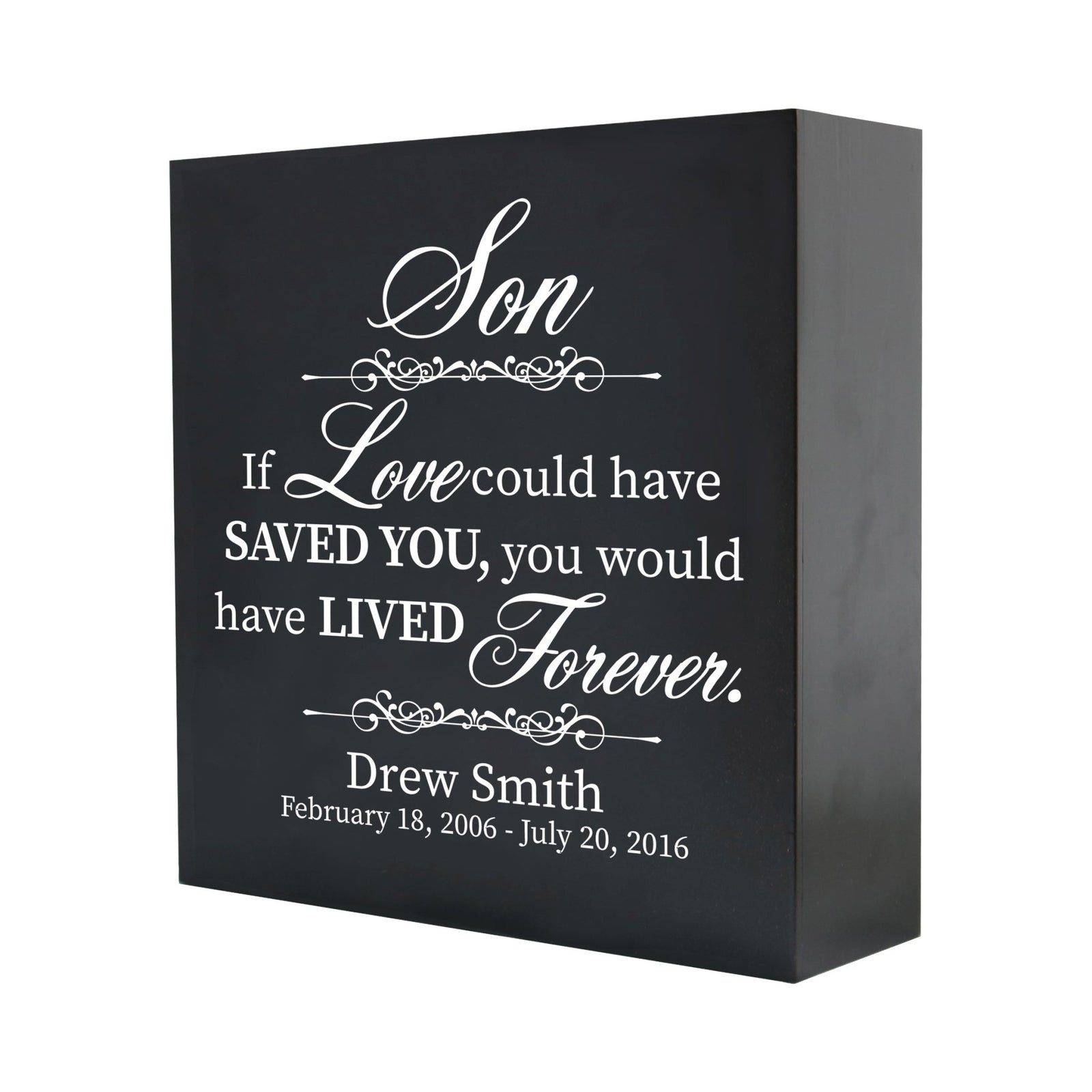 A close-up of a wooden shadow box urn for human ashes, crafted for adults, showcasing its sleek black finish and personalized white text memorializing a son. The detailed engraving reads, "If love could have saved you, you would have lived forever," offering a touching keepsake.