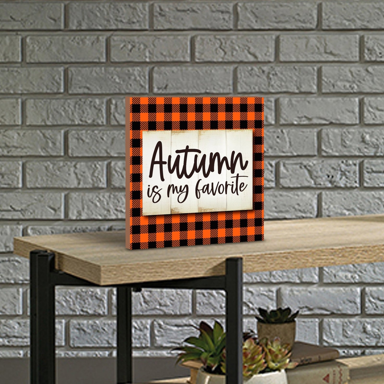 Rustic shelf decor with a collection of handcrafted wooden inspirational fall signs for a cozy autumn atmosphere.