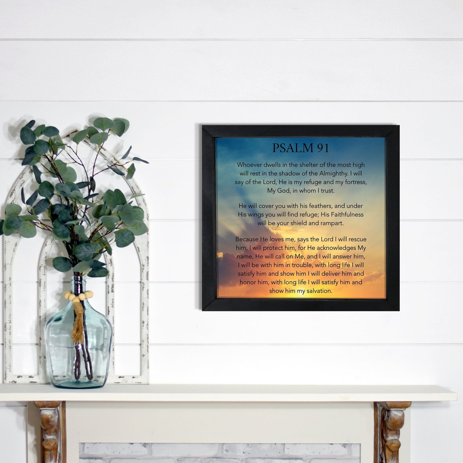 A framed shadow box with a heartfelt memorial tribute inside