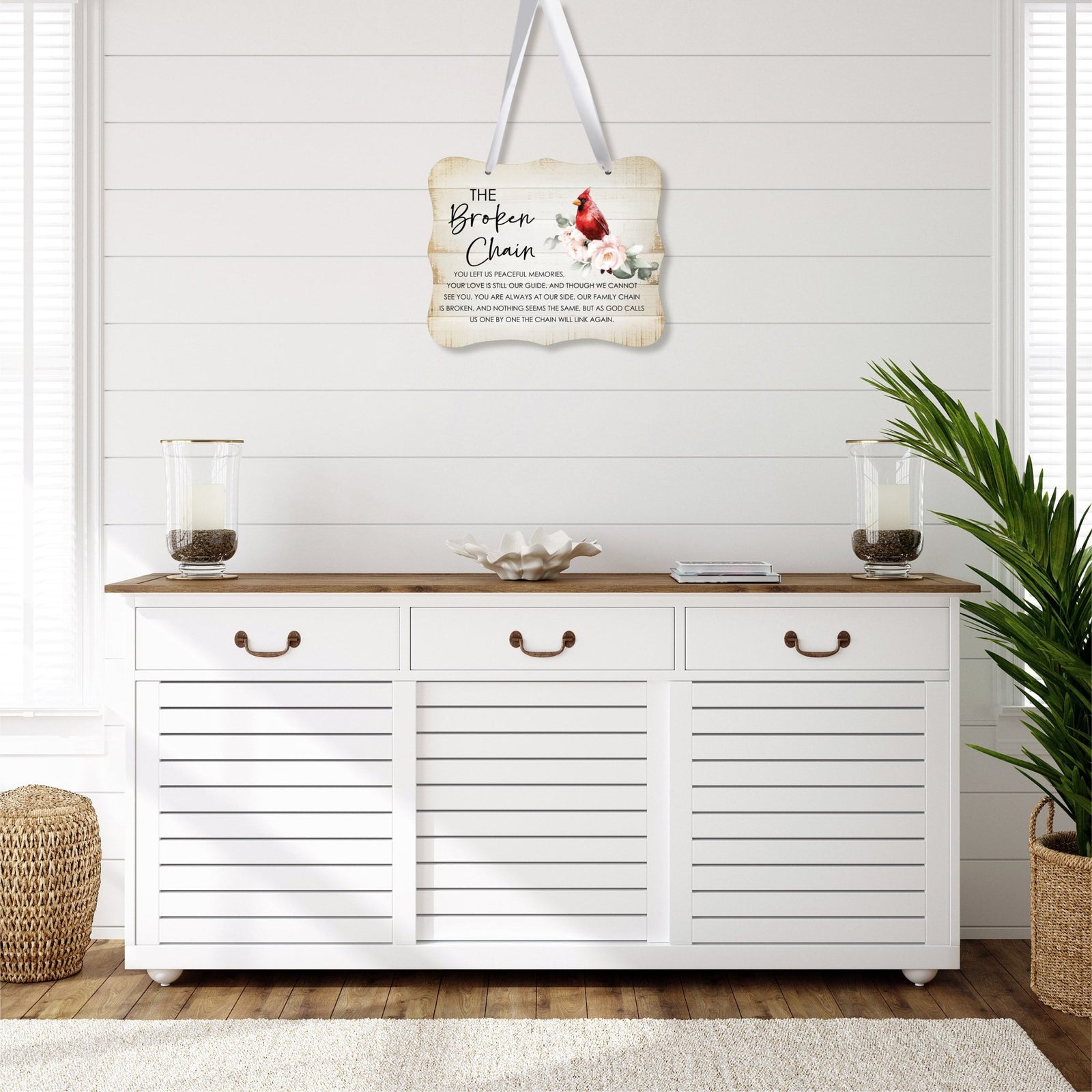A memorial wall hanging sign adorned with a cardinal ribbon, a symbol of remembrance.