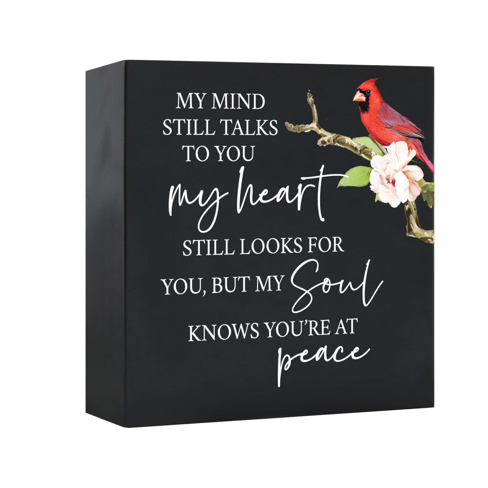 Close-up of a beautiful wooden shadow box urn for human ashes, accented with a red cardinal and white flowers. This adult memorial urn is both a heartfelt tribute and a decorative piece.