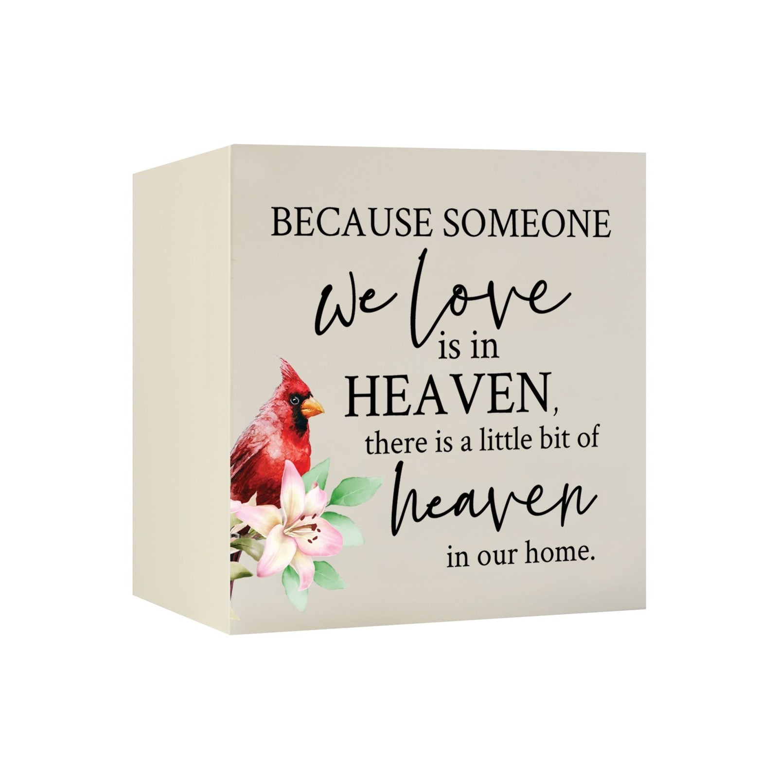 Close-up of a beautiful wooden shadow box urn for human ashes, accented with a red cardinal and white flowers. This adult memorial urn is both a heartfelt tribute and a decorative piece.