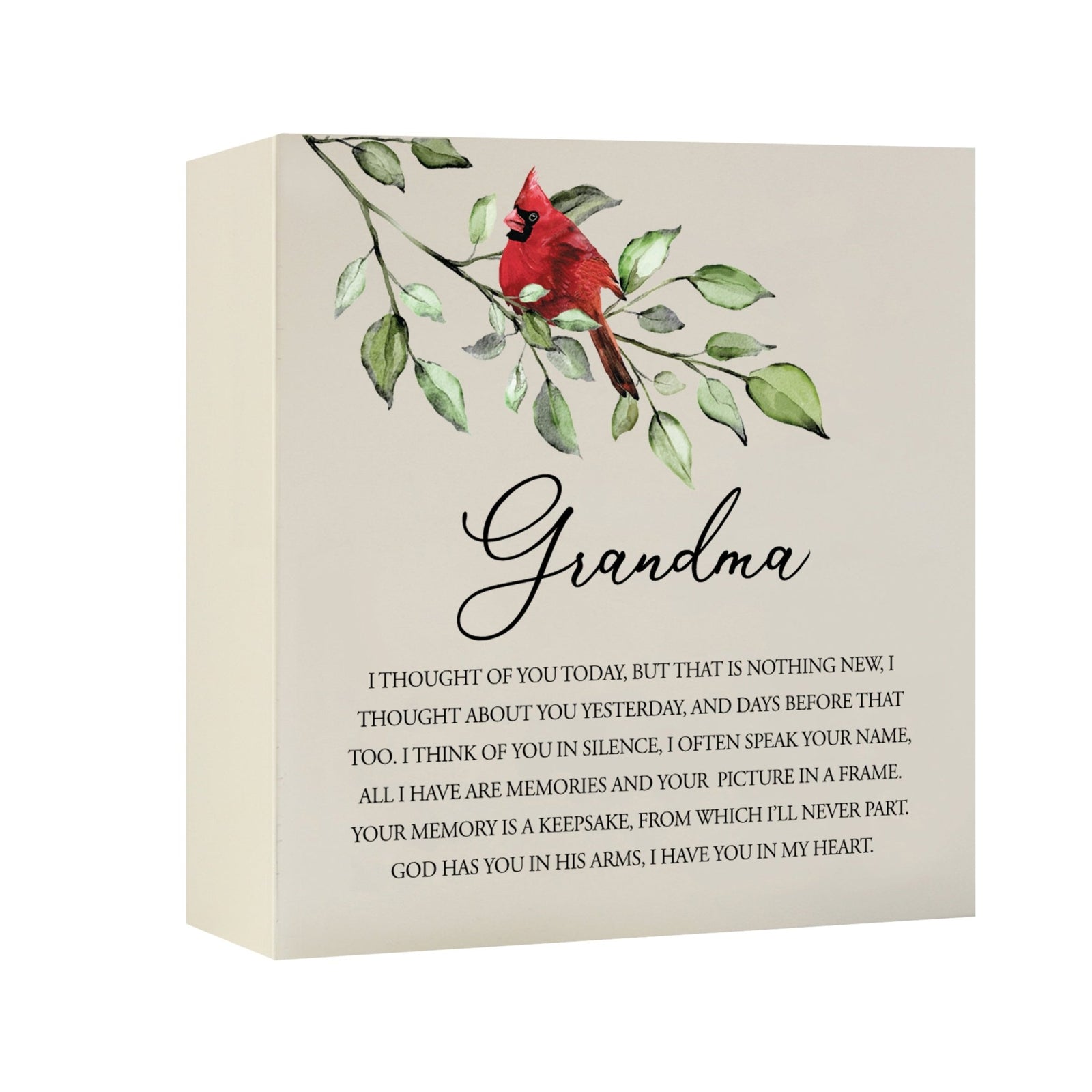 Close-up of a beautiful wooden shadow box urn for grandma, accented with a red cardinal and white flowers. This adult memorial urn is both a heartfelt tribute and a decorative piece.