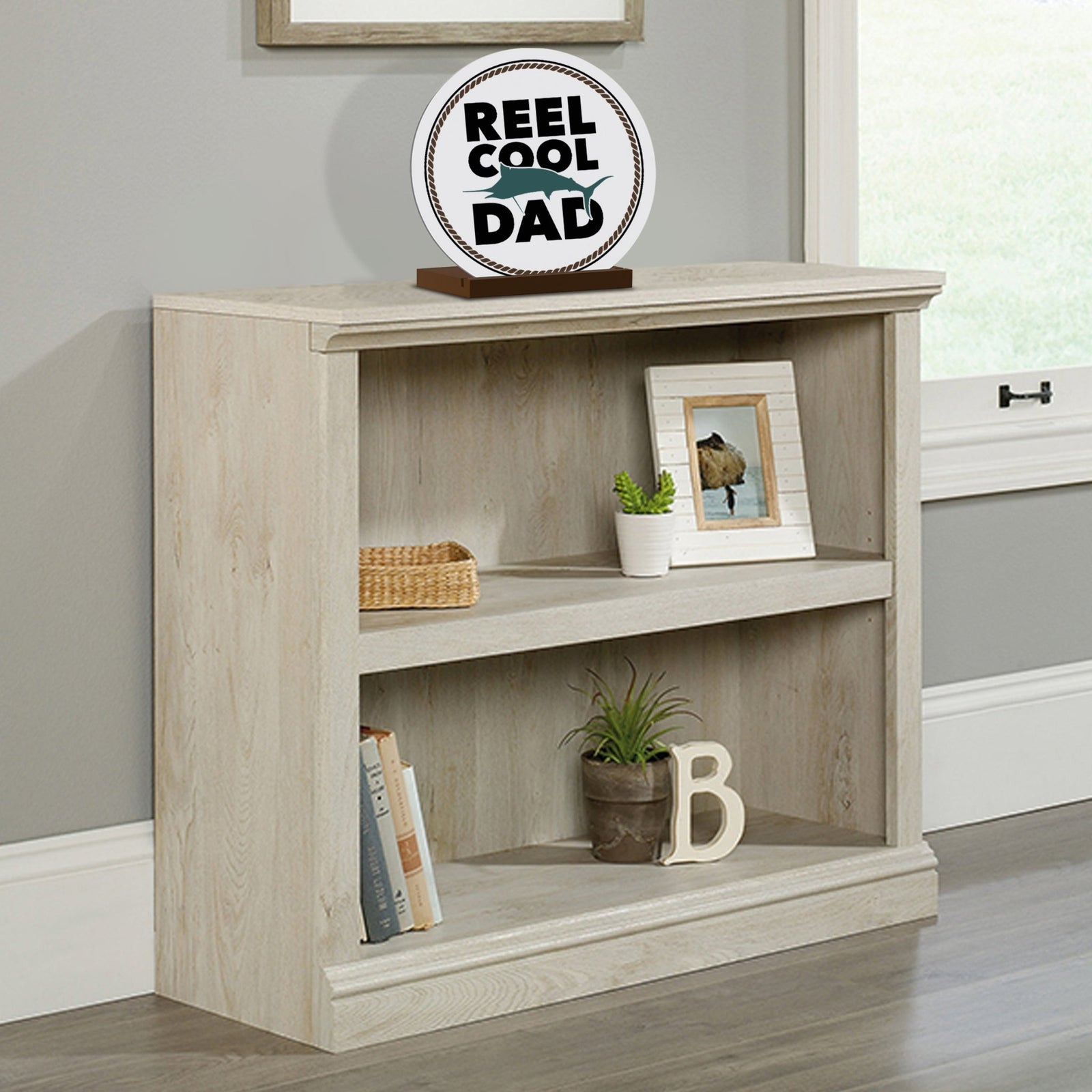 Minimalist White Round Sign With Wooden Base For A Fisherman Dad Gift Ideas - Reel Cool Dad - LifeSong Milestones