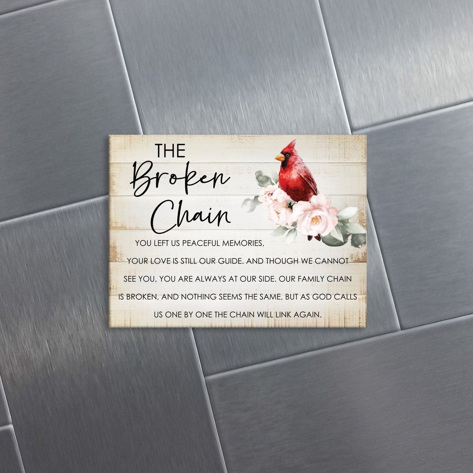 A modern cardinal magnet gracing a refrigerator - a heartfelt home decoration.