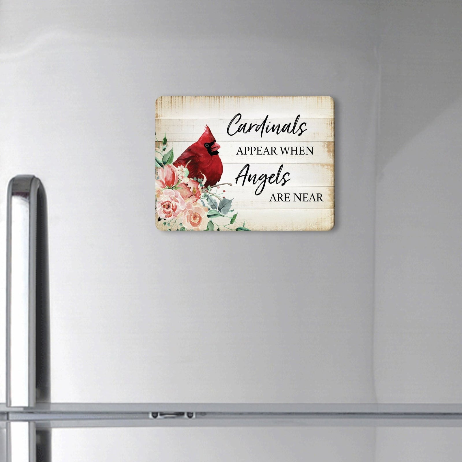 A modern cardinal magnet gracing a refrigerator - a heartfelt memorial home decoration.