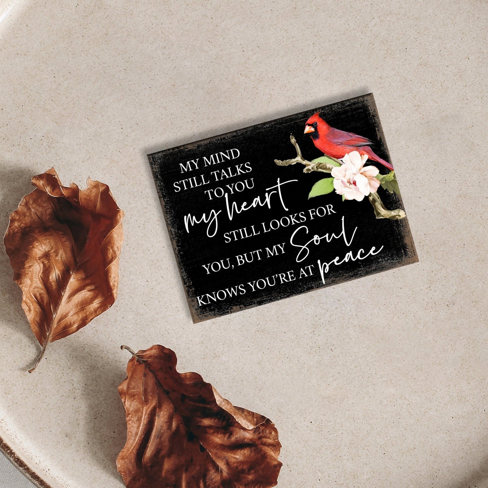 Remembering a loved one with a cardinal-themed memorial magnet for your home decor.