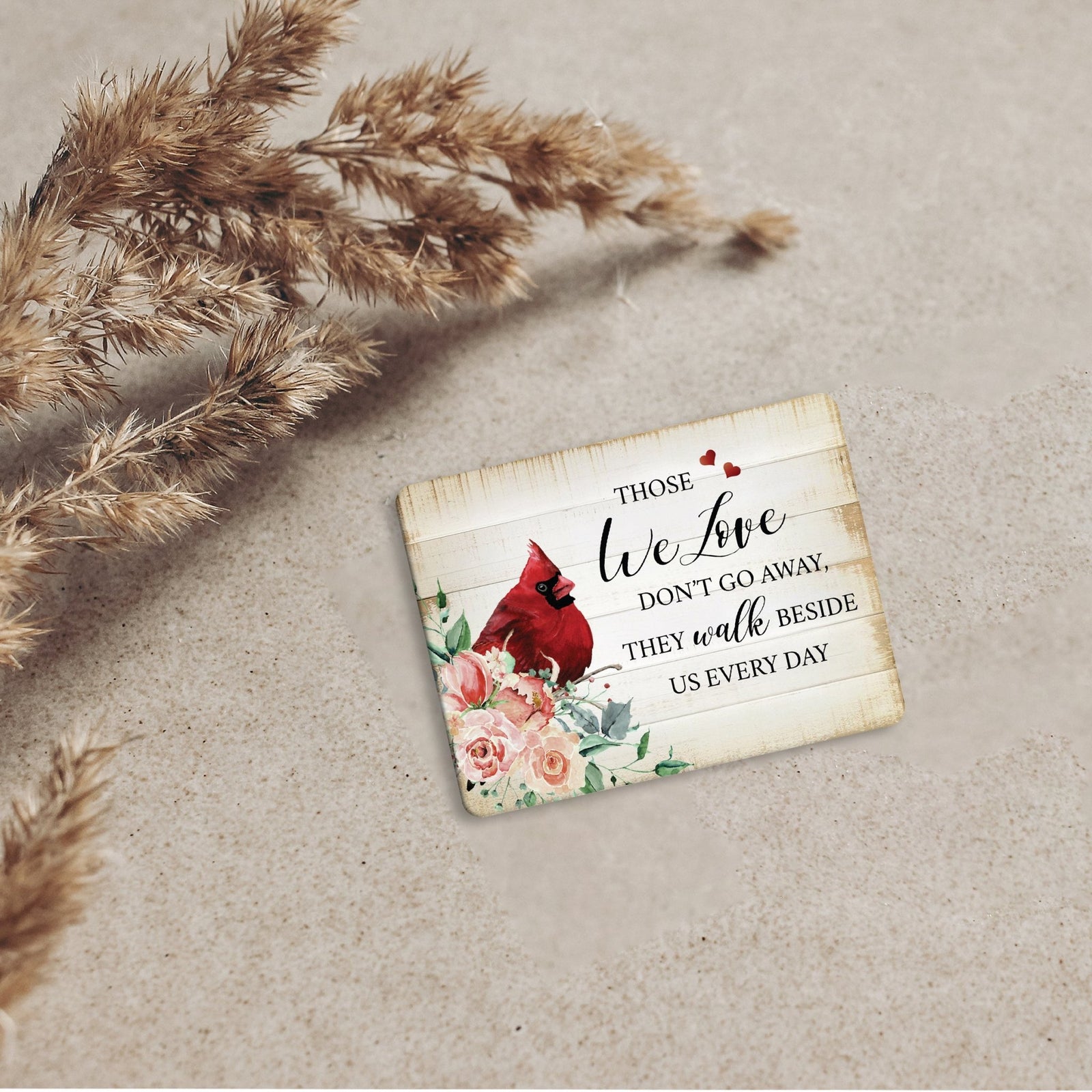 A cardinal magnet with a modern design, a heartfelt memorial home decoration.