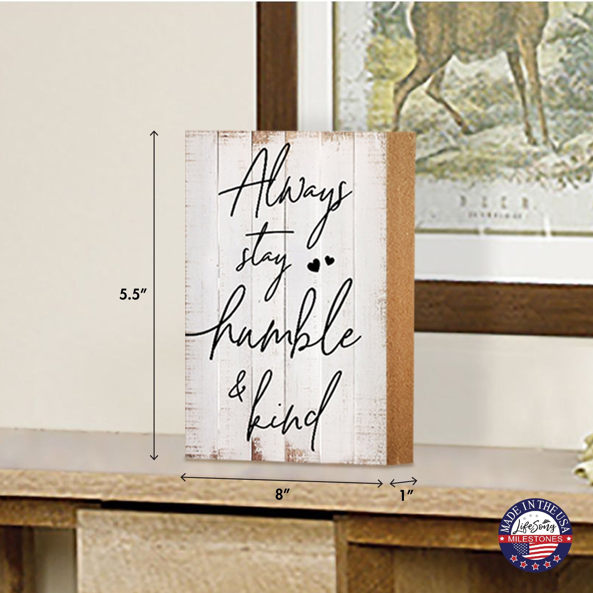 A wooden tabletop sign surrounded by delicate embellishments, making it a beautiful and meaningful addition to your home.