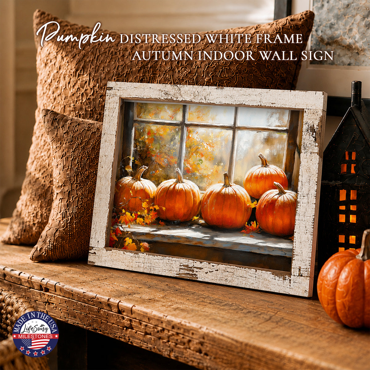 Framed autumn wall art of five orange pumpkins on a sunlit windowsill in a 13.75 x 17.75 inch distressed white barnwood frame