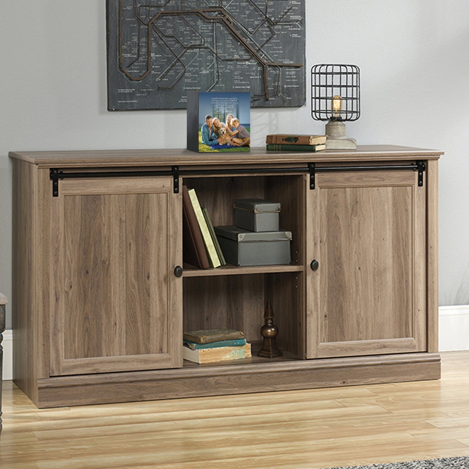 Custom wooden pet urn shadow box displayed on a rustic wooden cabinet in a cozy living room. The personalized pet memorial shadow box features a customized photo of a pet and a heartfelt message. A perfect bereavement keepsake box and sympathy gift for honoring the loss of a beloved pet, blending warmth and sentiment with home décor.