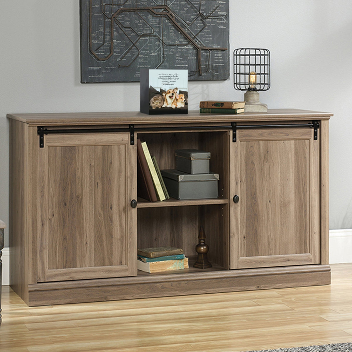 Custom wooden pet urn shadow box displayed on a rustic wooden cabinet in a cozy living room. The personalized pet memorial shadow box features a customized photo of a pet and a heartfelt message. A perfect bereavement keepsake box and sympathy gift for honoring the loss of a beloved pet, blending warmth and sentiment with home décor.