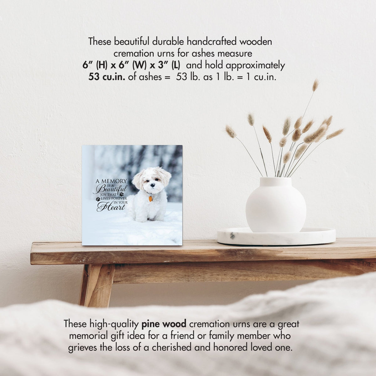 Wooden pet urn shadow box by Lifesong Milestones displayed on a rustic wooden table with a white vase of pampas grass, showcasing a photo of a pet with the heartfelt message. Ideal for memorial shadow box ideas or pet urns for ashes.