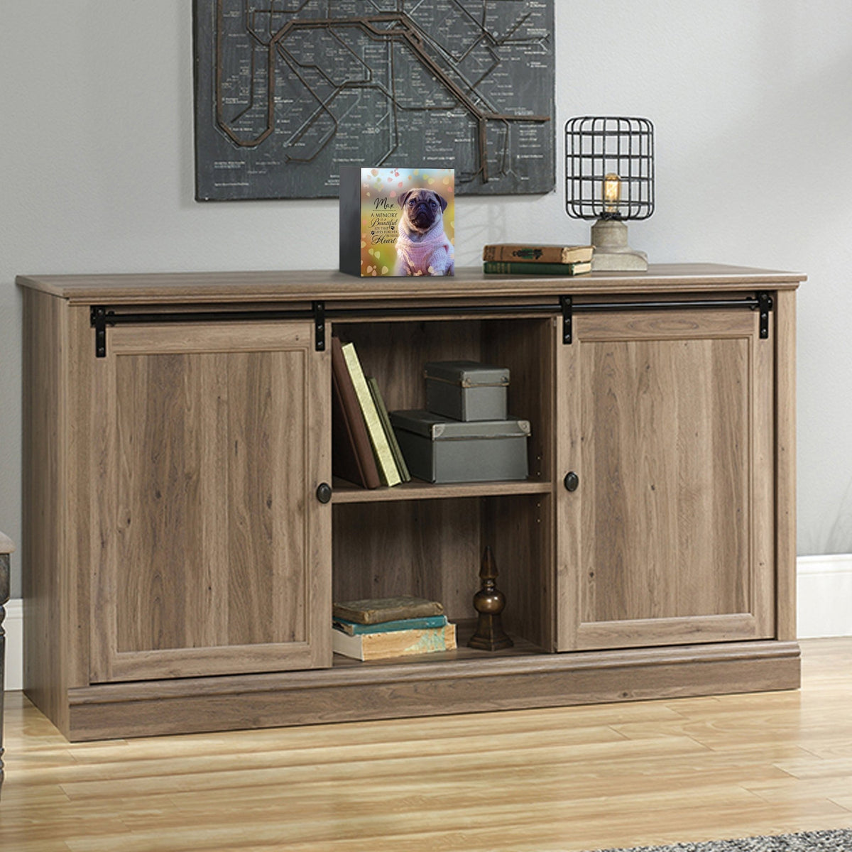 Custom wooden pet urn shadow box displayed on a rustic wooden cabinet in a cozy living room. The personalized pet memorial shadow box features a customized photo of a pet and a heartfelt message. A perfect bereavement keepsake box and sympathy gift for honoring the loss of a beloved pet, blending warmth and sentiment with home décor.