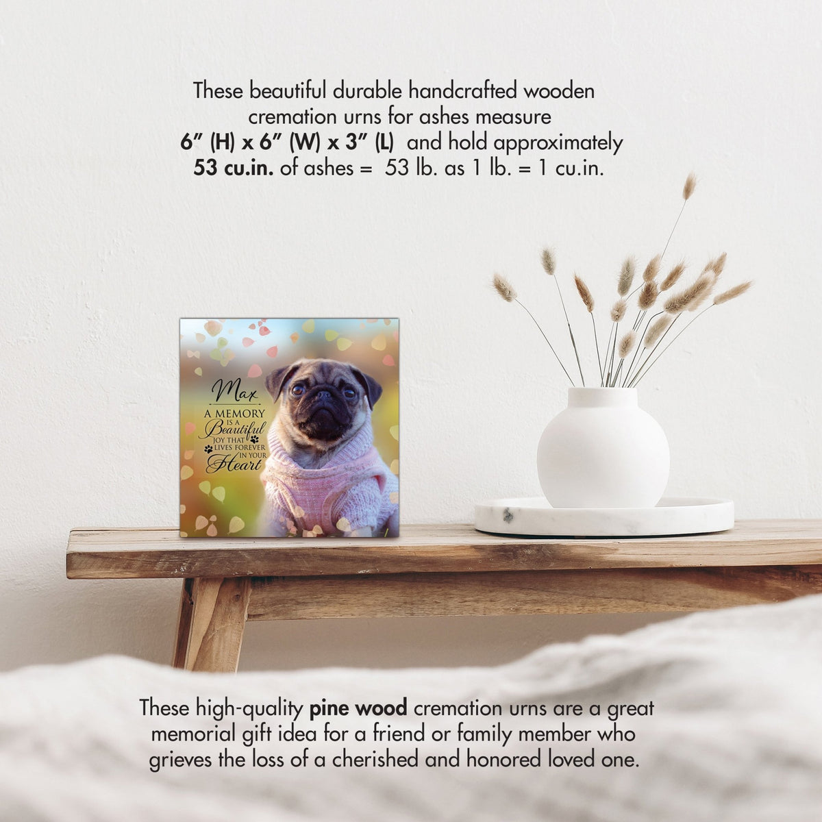 Wooden pet urn shadow box by Lifesong Milestones displayed on a rustic wooden table with a white vase of pampas grass, showcasing a custom photo of Bella with the heartfelt message. Ideal for memorial shadow box ideas or personalized pet urns for ashes