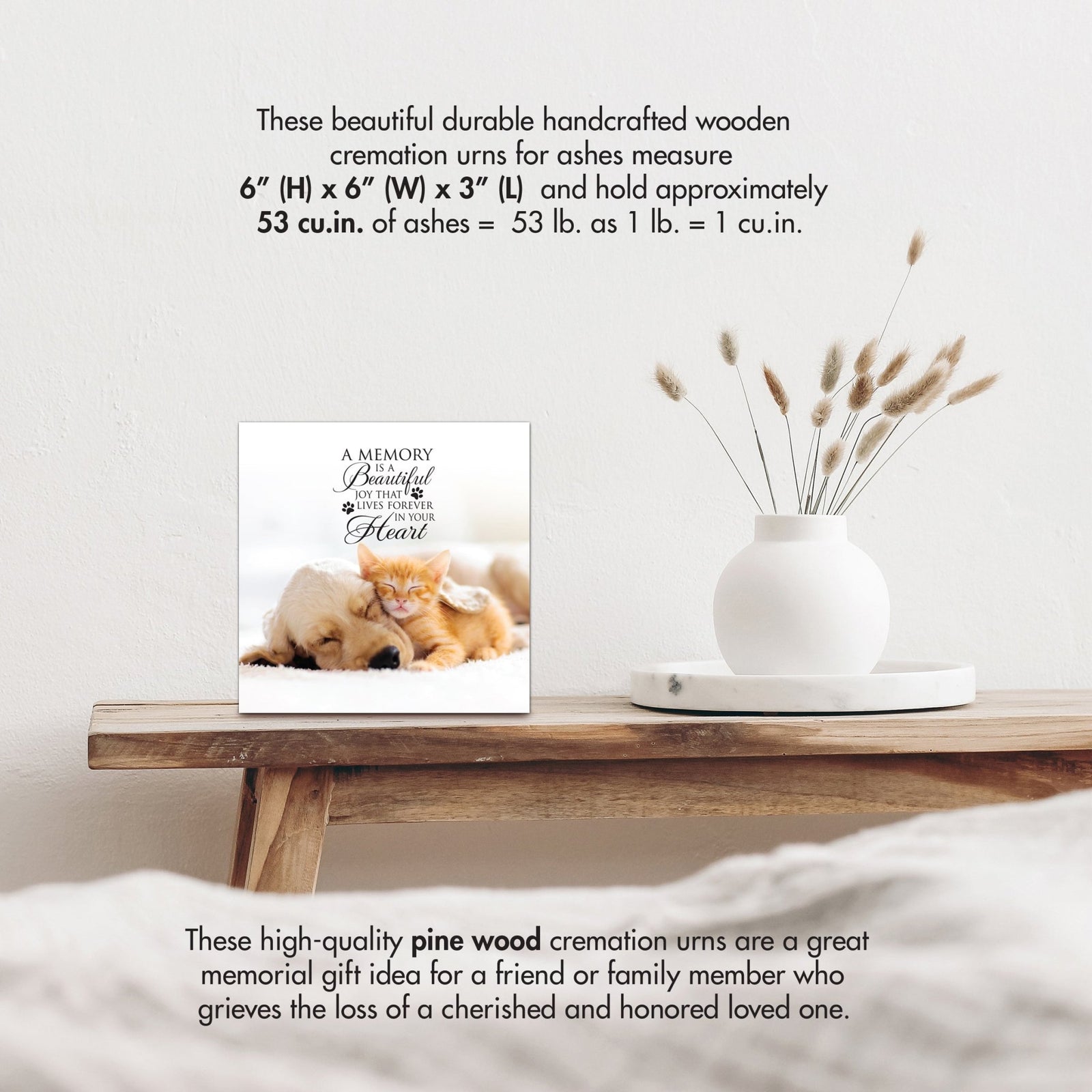 Wooden pet urn shadow box by Lifesong Milestones displayed on a rustic wooden table with a white vase of pampas grass, showcasing a custom photo of Bella with the heartfelt message. Ideal for memorial shadow box ideas or personalized pet urns for ashes