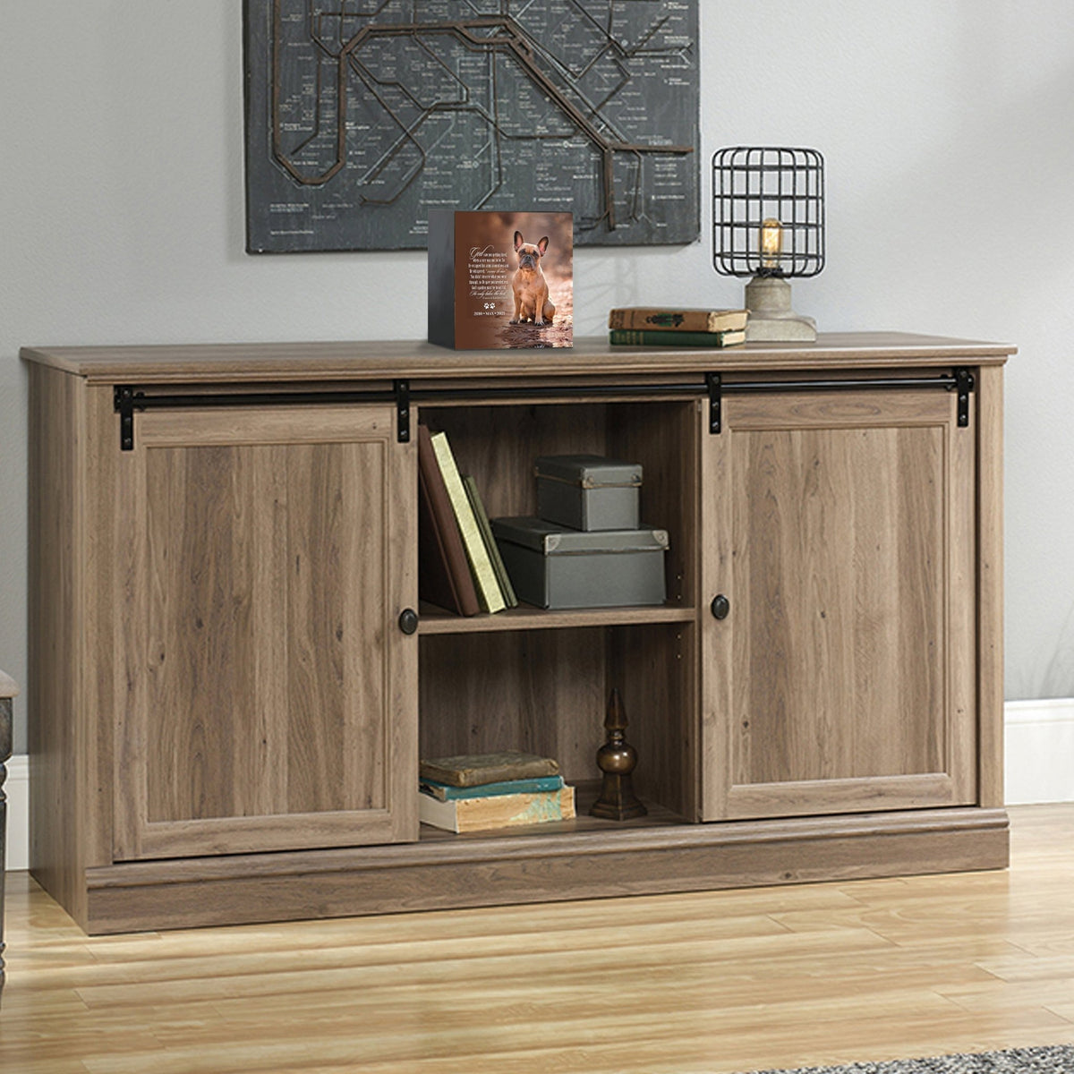 Custom wooden pet urn shadow box displayed on a rustic wooden cabinet in a cozy living room. The personalized pet memorial shadow box features a customized photo of a pet and a heartfelt message. A perfect bereavement keepsake box and sympathy gift for honoring the loss of a beloved pet, blending warmth and sentiment with home décor.