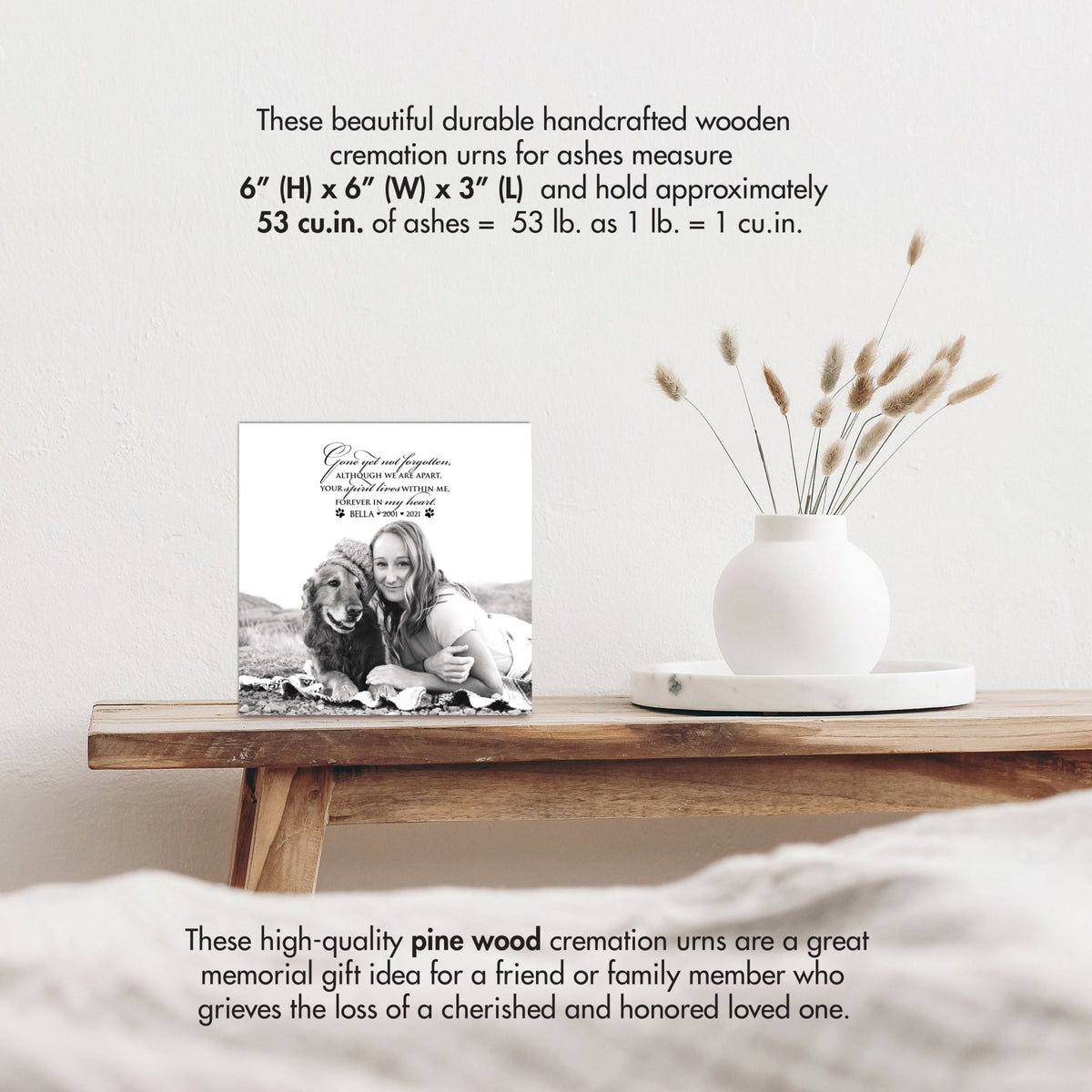 Wooden pet urn shadow box by Lifesong Milestones displayed on a rustic wooden table with a white vase of pampas grass, showcasing a custom photo of a pet with the heartfelt message. Ideal for memorial shadow box ideas or personalized pet urns for ashes