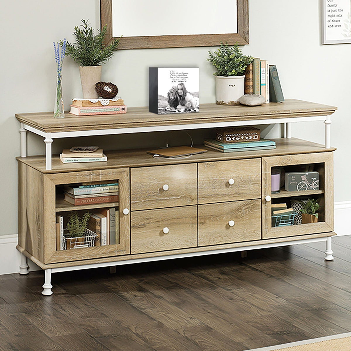 Wooden pet urn shadow box displayed on a rustic wooden TV console in a cozy living room. The shadow box features a custom photo of a pet. A touching bereavement keepsake box ideal for memorial shadow box ideas and personalized pet urns for ashes.