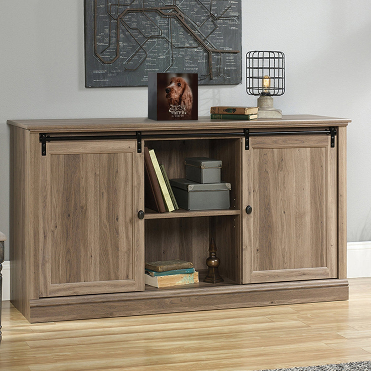 Custom pet cremation urns for ashes displayed on a stylish console table.