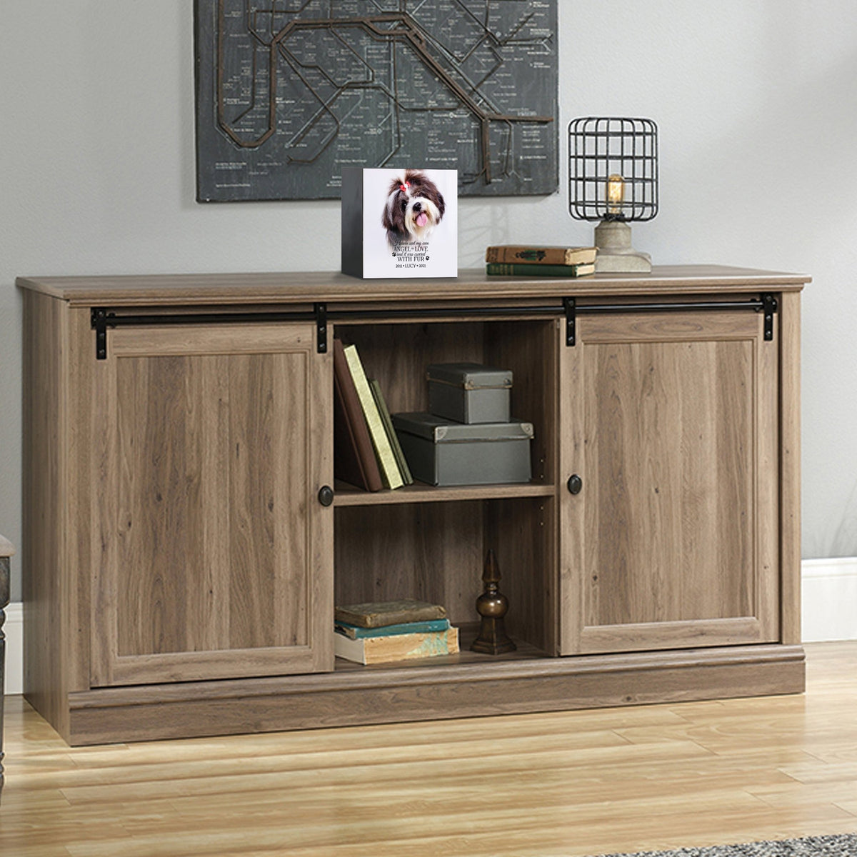 Custom pet cremation urns for ashes displayed on a stylish console table.