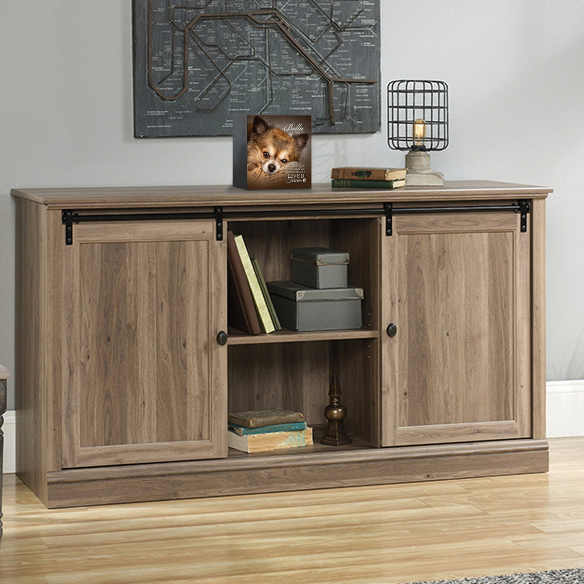 Custom wooden pet urn shadow box displayed on a rustic wooden cabinet in a cozy living room. The personalized pet memorial shadow box features a customized photo of a dog and a heartfelt . A perfect bereavement keepsake box and sympathy gift for honoring the loss of a beloved pet, blending warmth and sentiment with home décor.