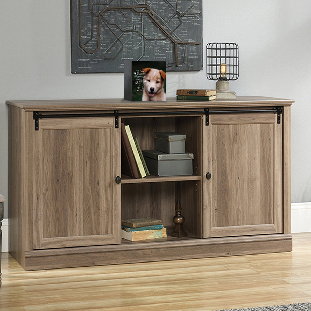 Custom pet cremation urns for ashes displayed on a stylish console table.