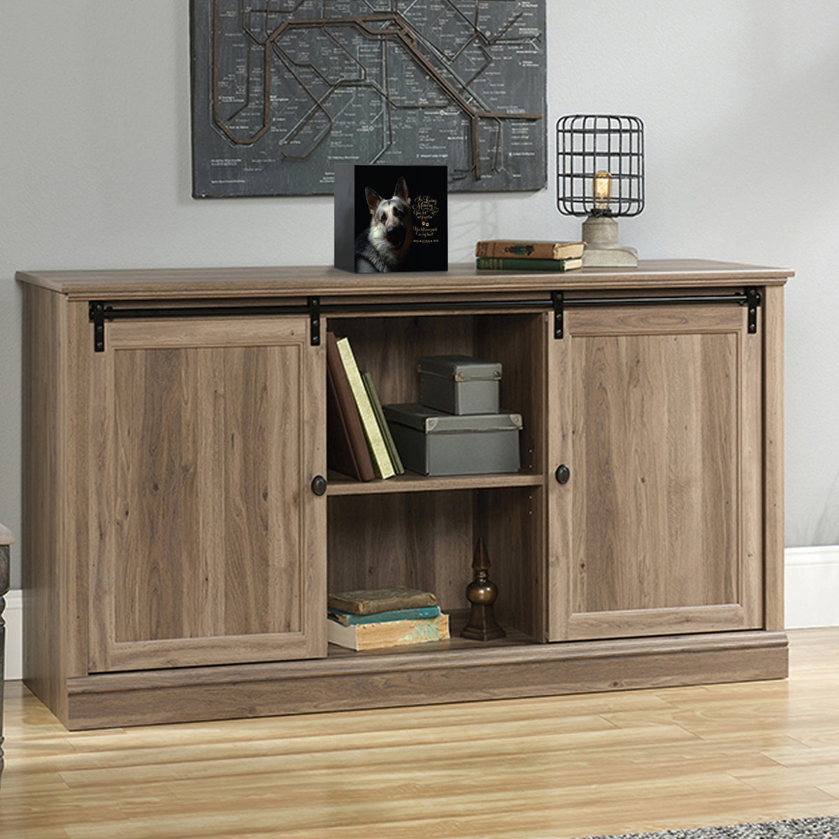 Custom pet cremation urns for ashes displayed on a stylish console table.