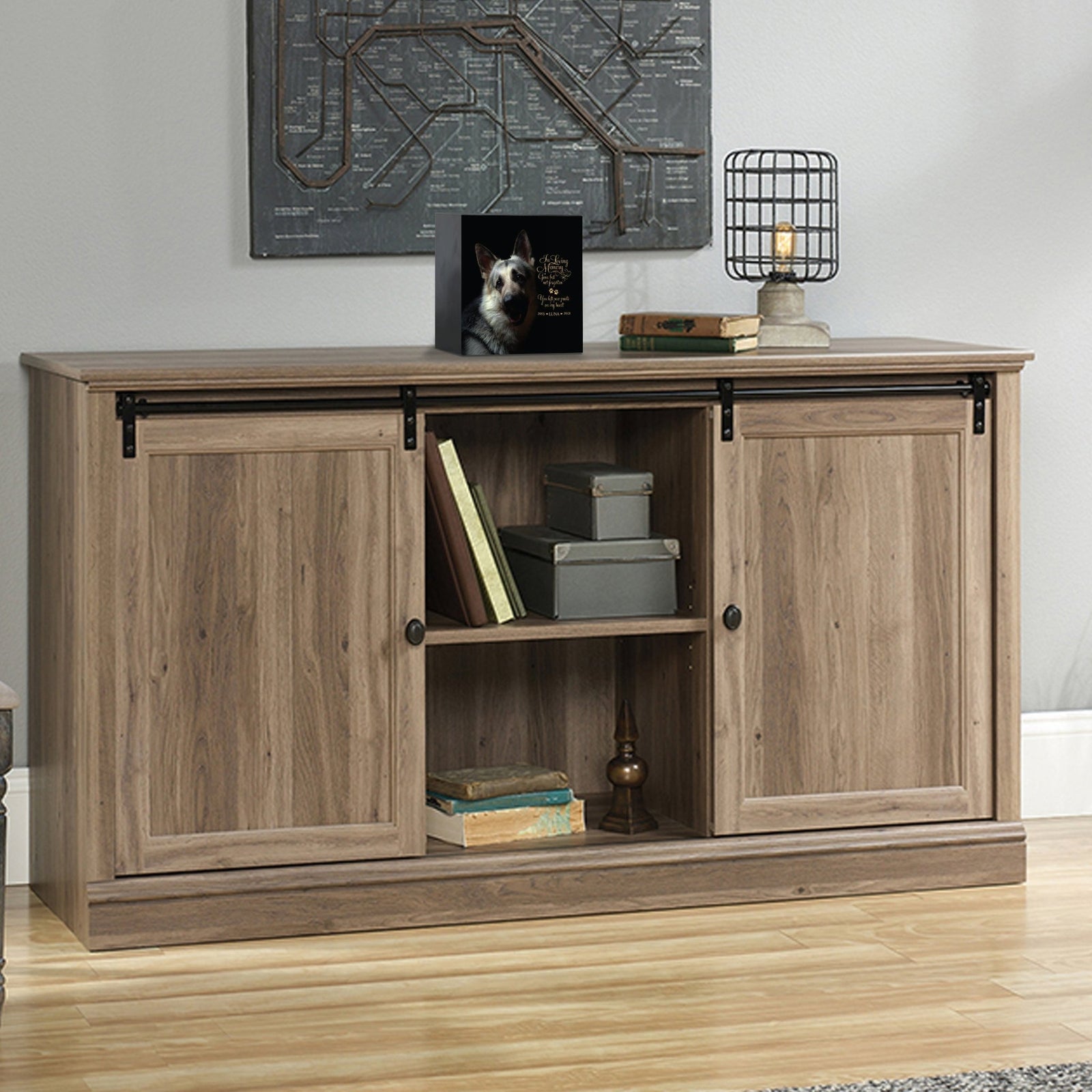Custom pet cremation urns for ashes displayed on a stylish console table.