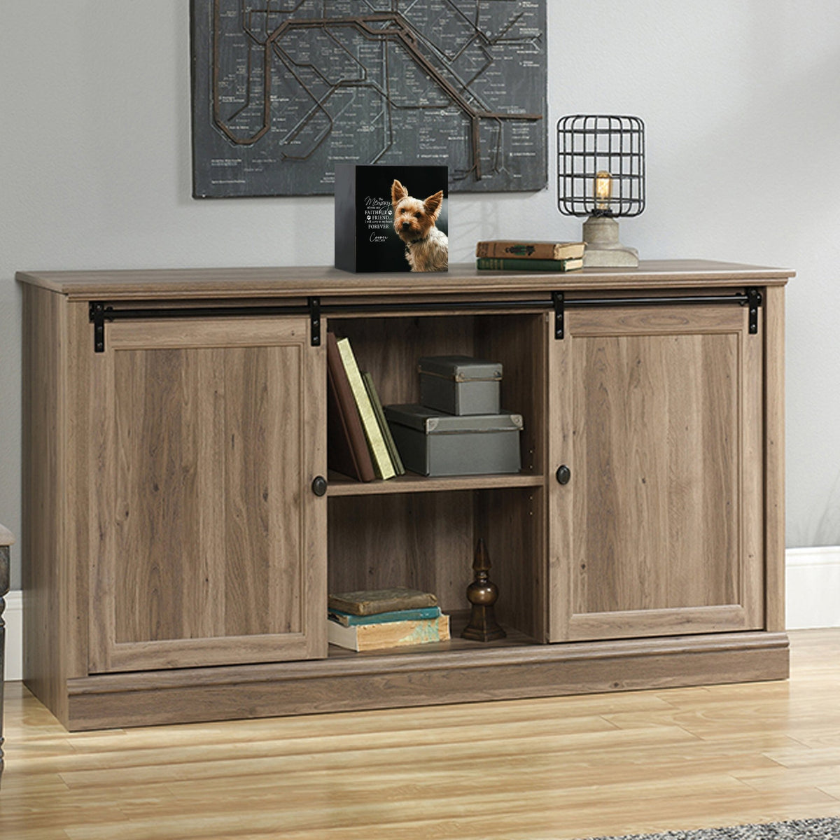 Custom wooden pet urn shadow box displayed on a rustic wooden cabinet in a cozy living room. The personalized pet memorial shadow box features a customized photo of a pet and a heartfelt message. A perfect bereavement keepsake box and sympathy gift for honoring the loss of a beloved pet, blending warmth and sentiment with home décor.