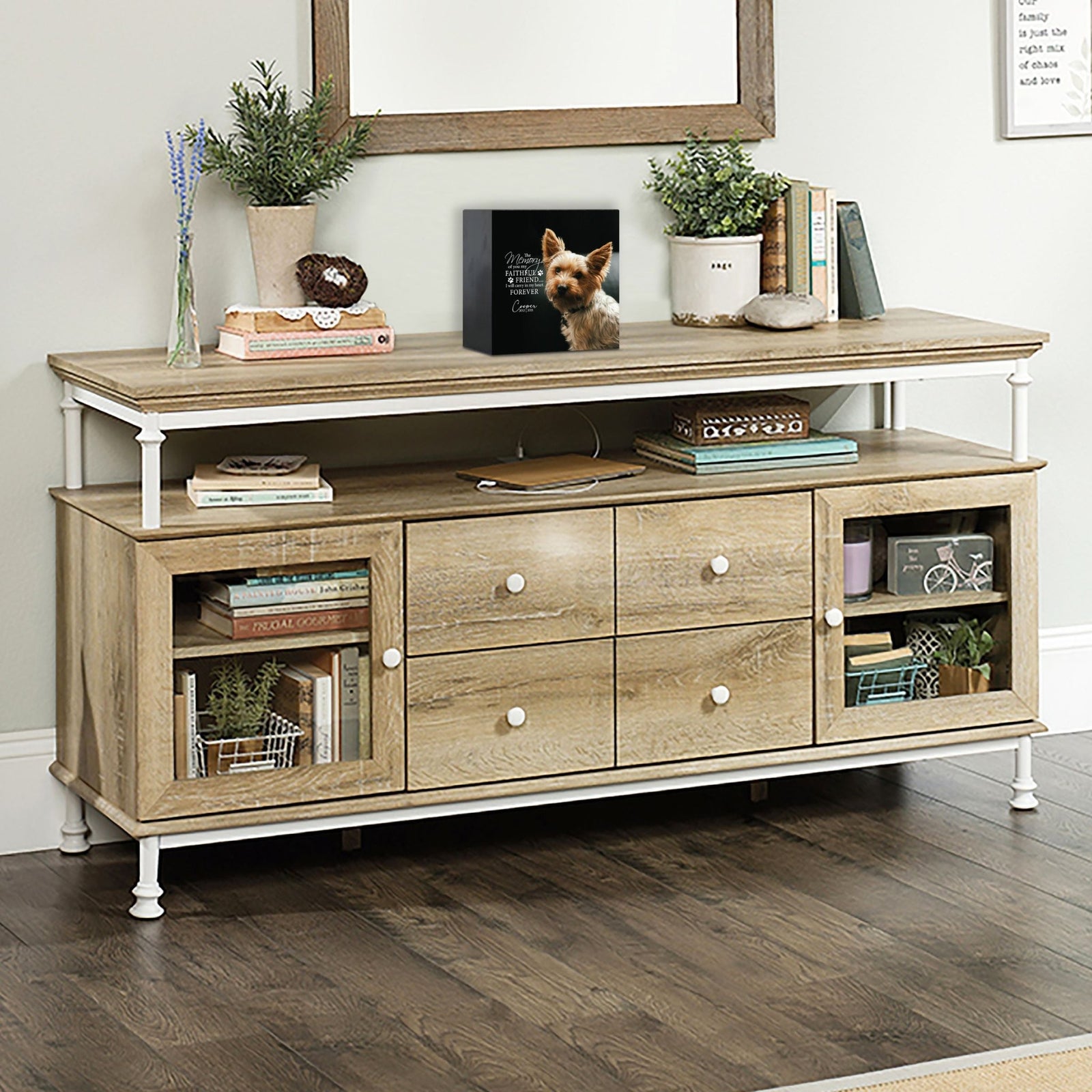 Wooden pet urn shadow box displayed on a rustic wooden TV console in a cozy living room. The shadow box features a custom photo of a pet. A touching bereavement keepsake box ideal for memorial shadow box ideas and personalized pet urns for ashes.