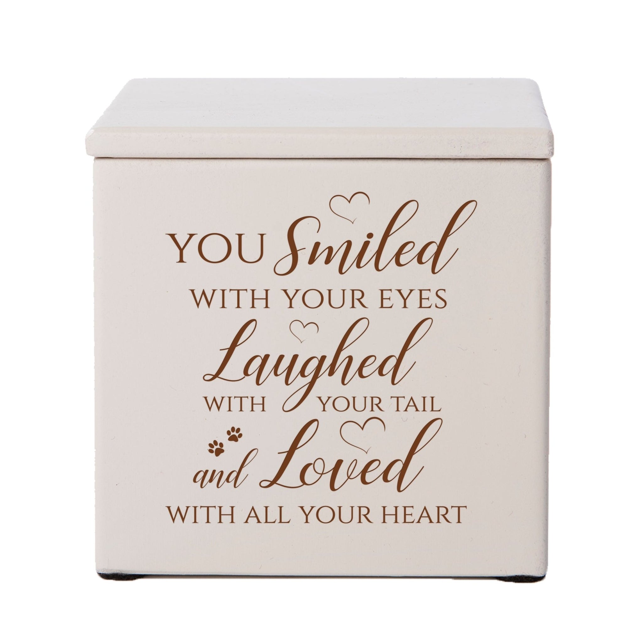 A classic ivory Pet Urns for Ashes featuring a sentimental engraving and delicate paw prints.