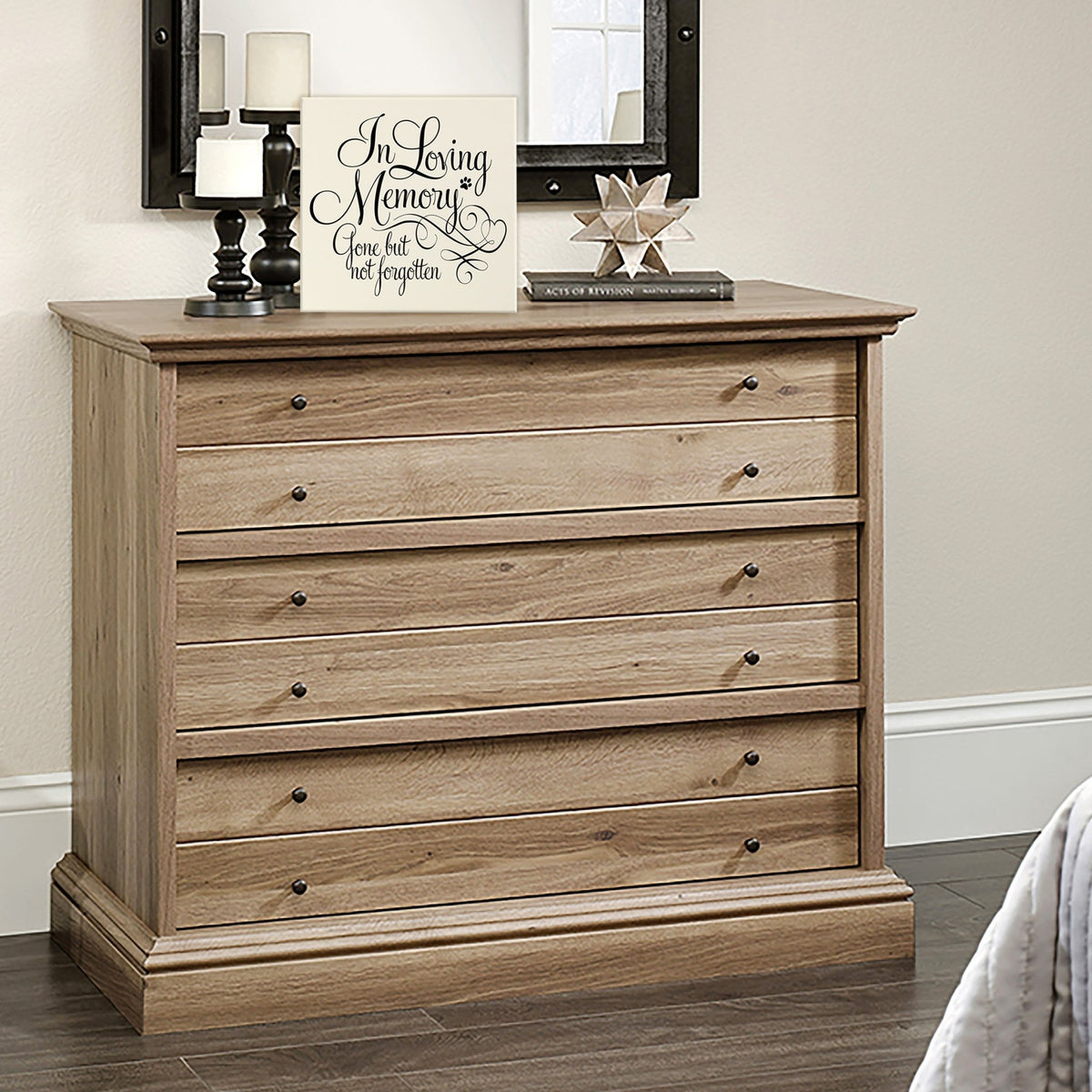Lifesong Milestones Memorial Shadow Box Urn For Pet Ashes in white, displayed on a stylish shelf with coastal décor, reminding pet owners of the everlasting joy and love their furry friend brought into their lives.