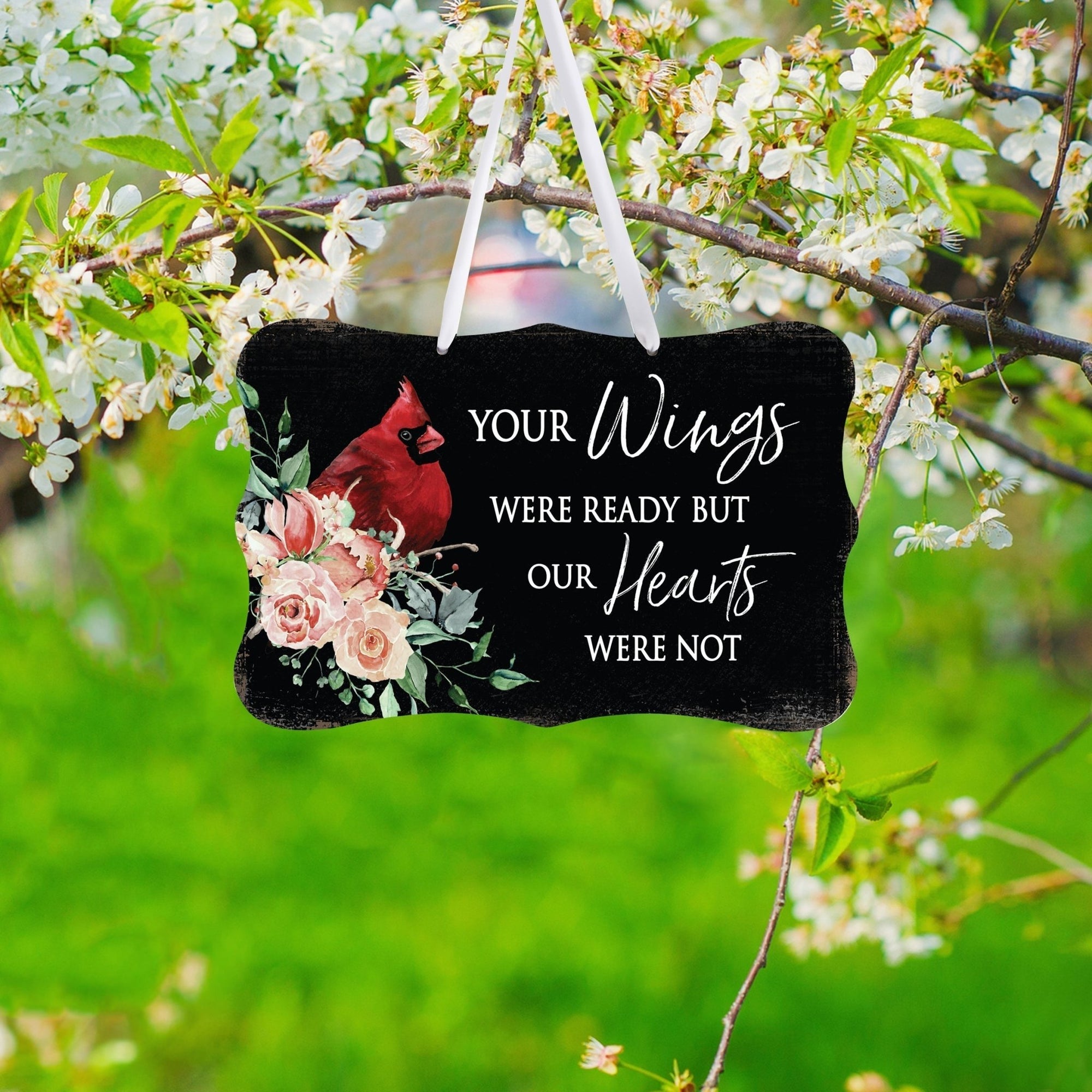 A memorial wall hanging sign adorned with a cardinal ribbon, a symbol of remembrance.